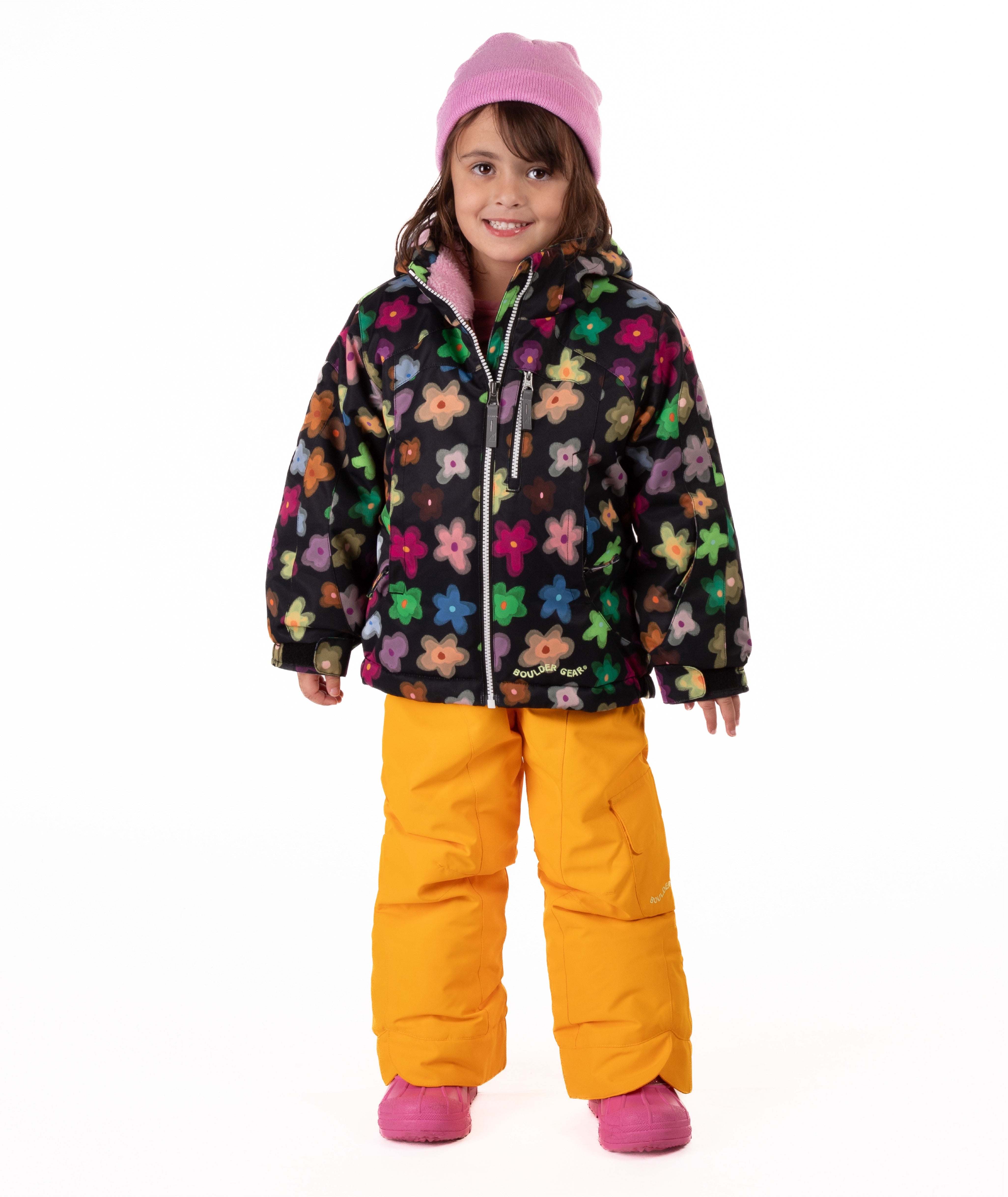 Child wearing a colorful floral patterned jacket on a white background