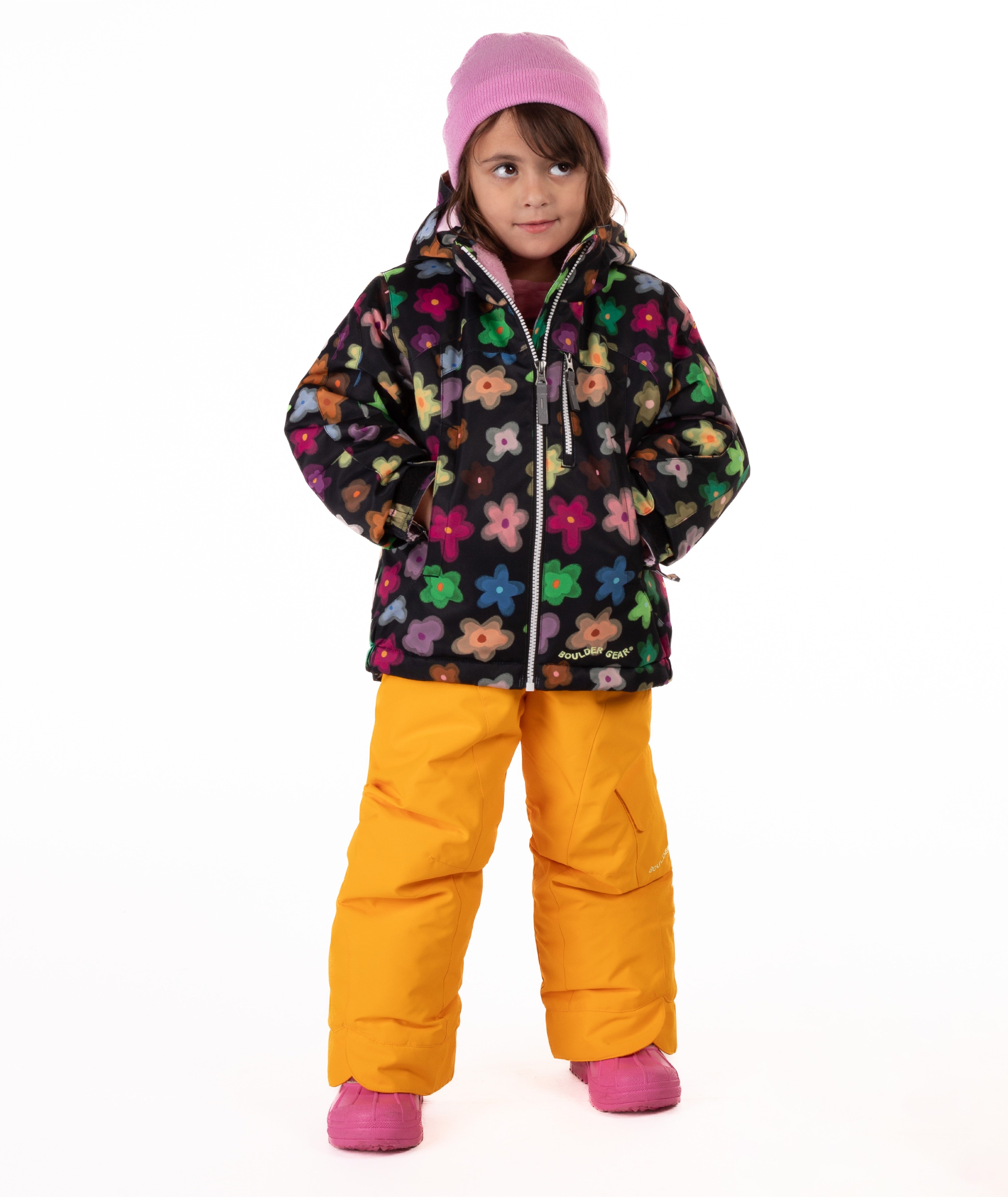 Child wearing a colorful floral patterned jacket on a white background