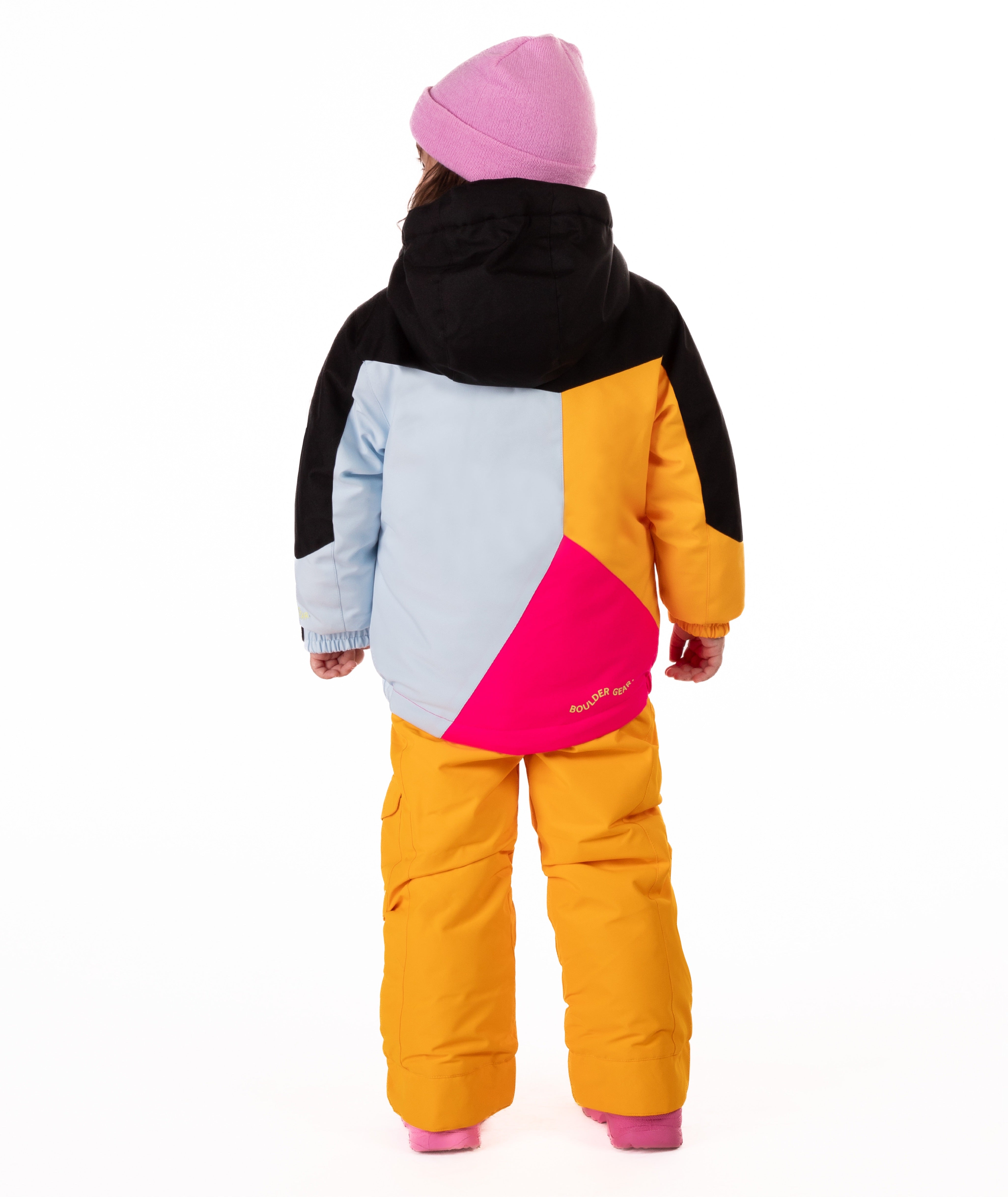Child wearing a colorful jacket geometric designed winter jacket with light blue, bright pink, orange, and black on a white background.