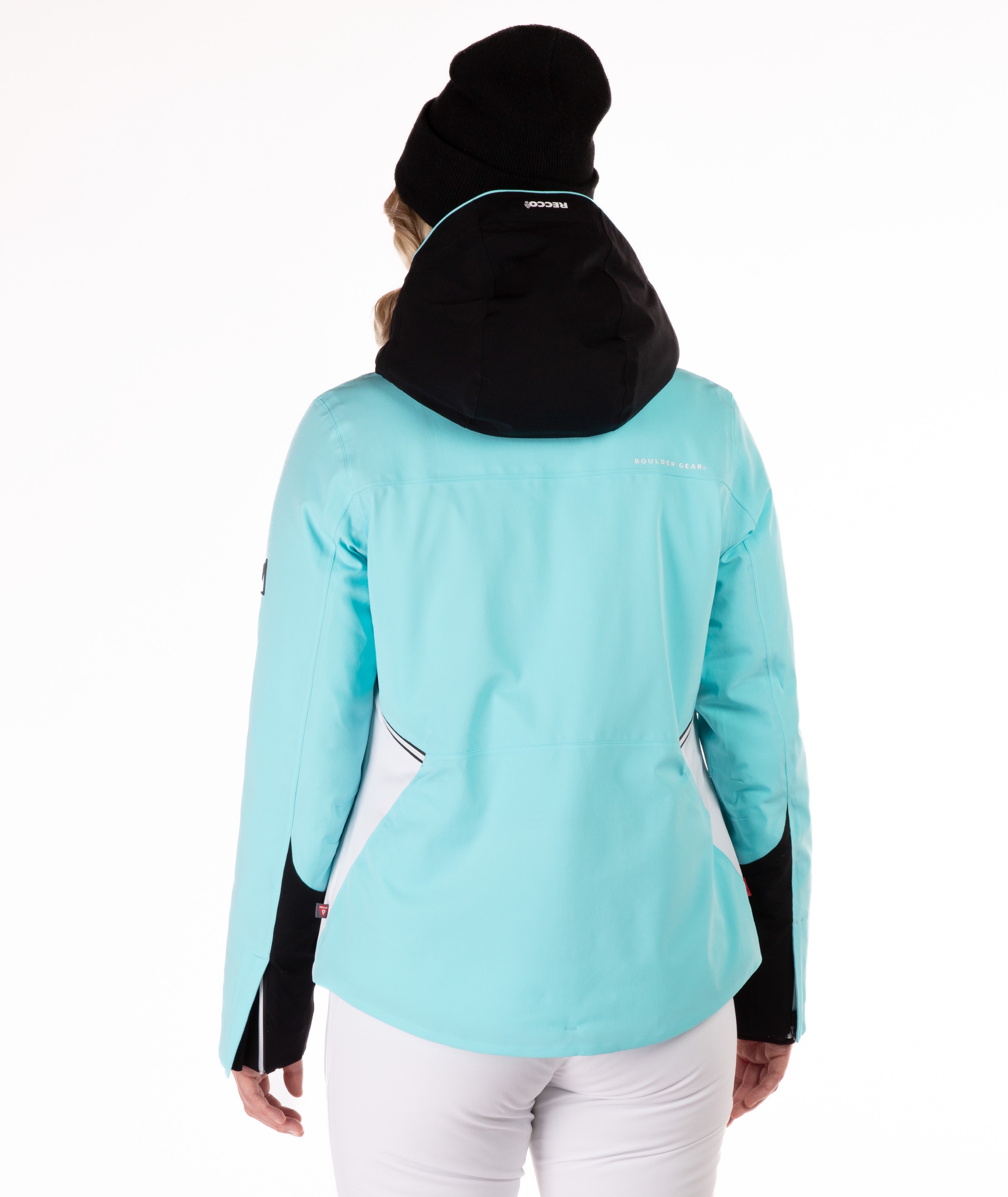 Back view of a person wearing a light blue ski jacket with black accents on a white background