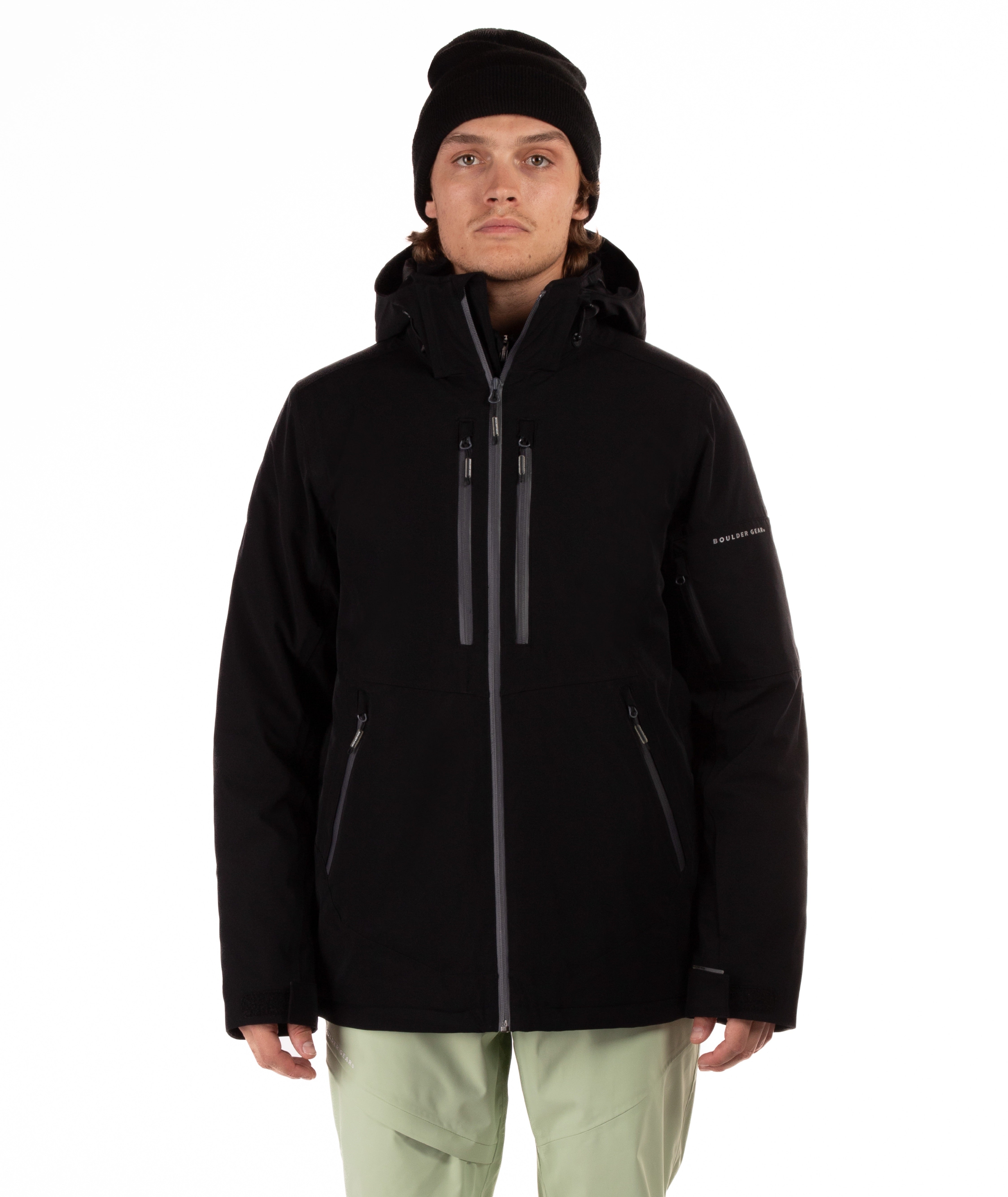 Person wearing a black jacket on a white background