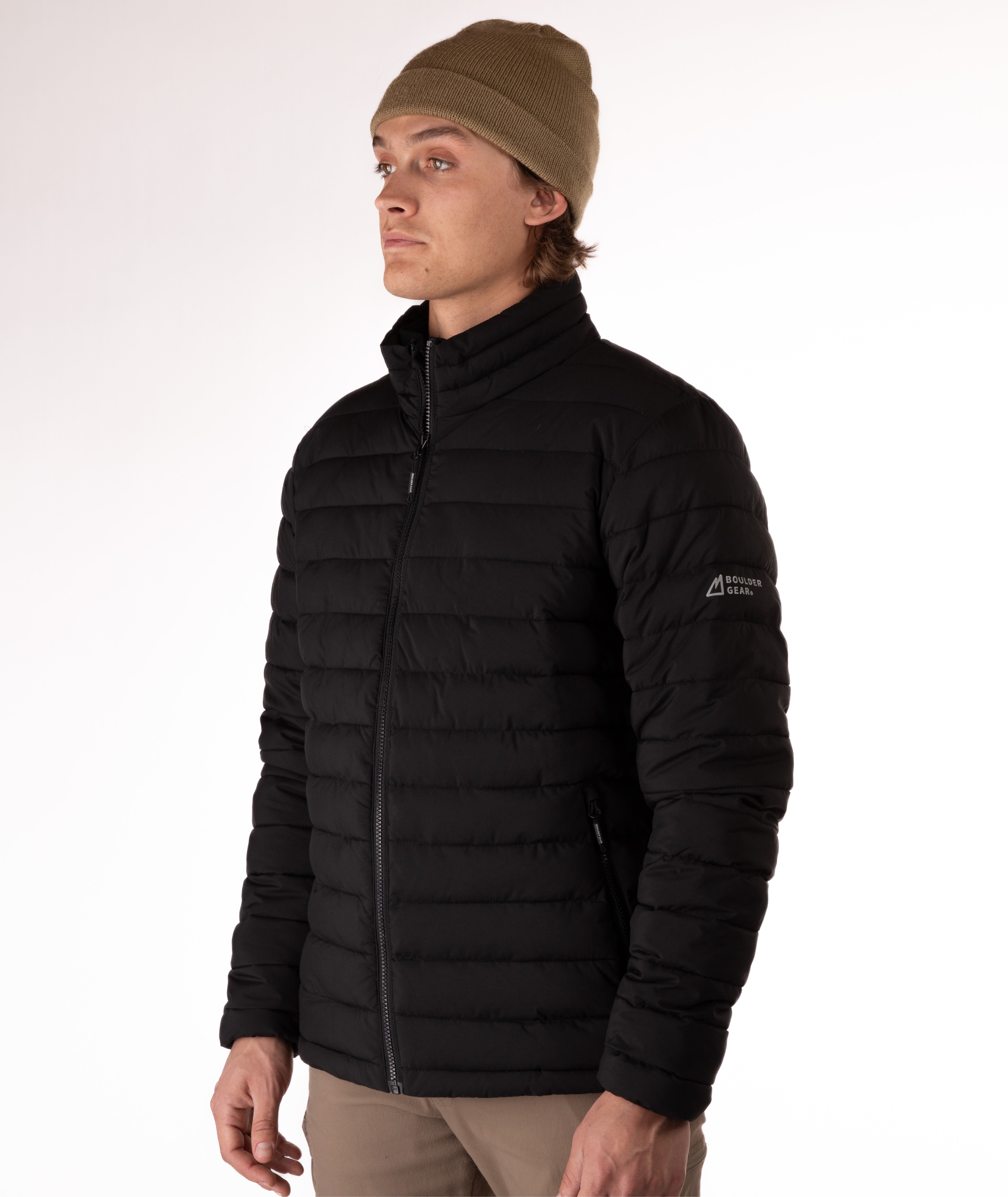 Man wearing a black puffer jacket on a white background