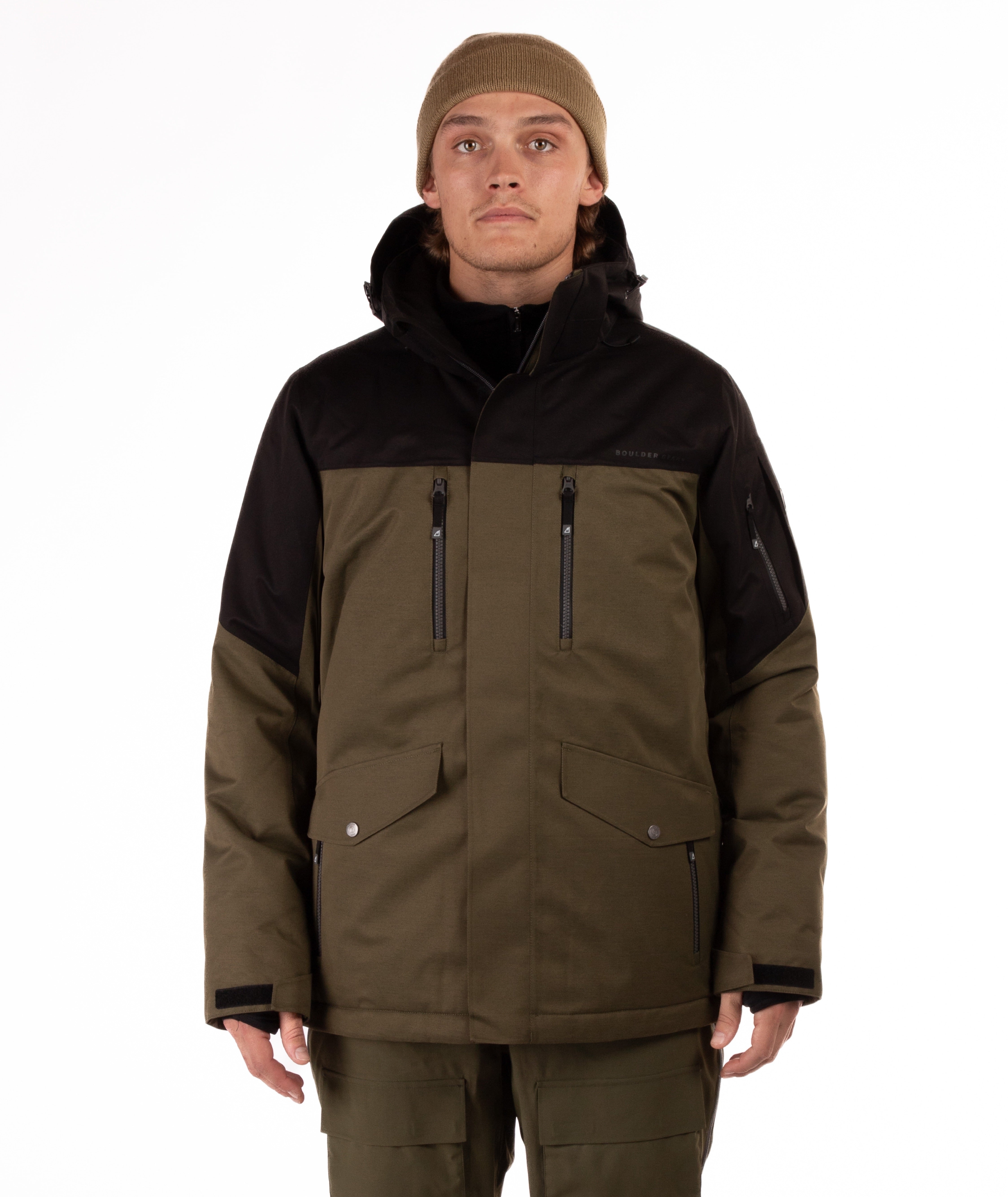 Man wearing a olive green and black jacket on a white background