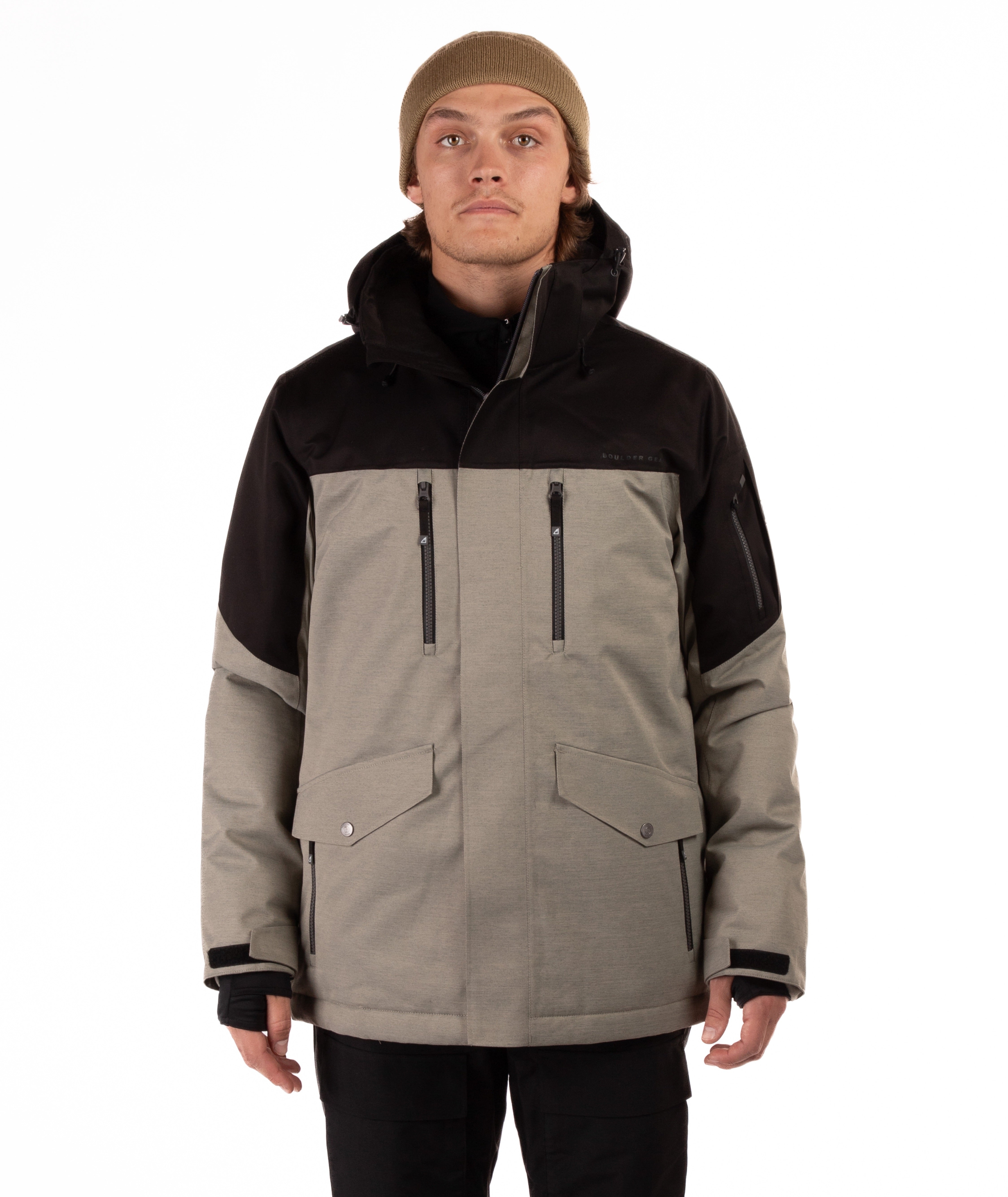 Person wearing a black and gray jacket with a white background