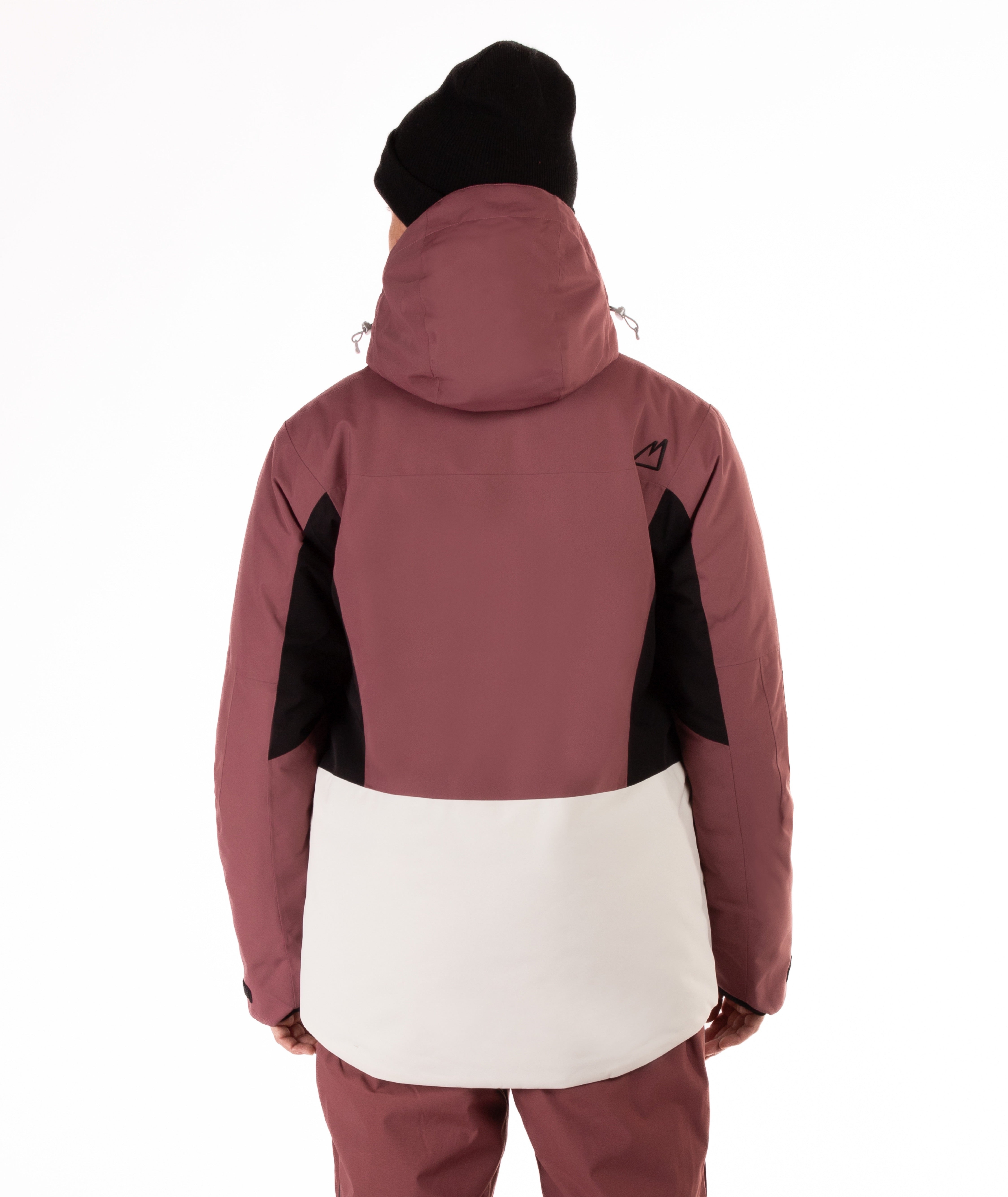 Person wearing a maroon and black jacket with a white panel on a white background