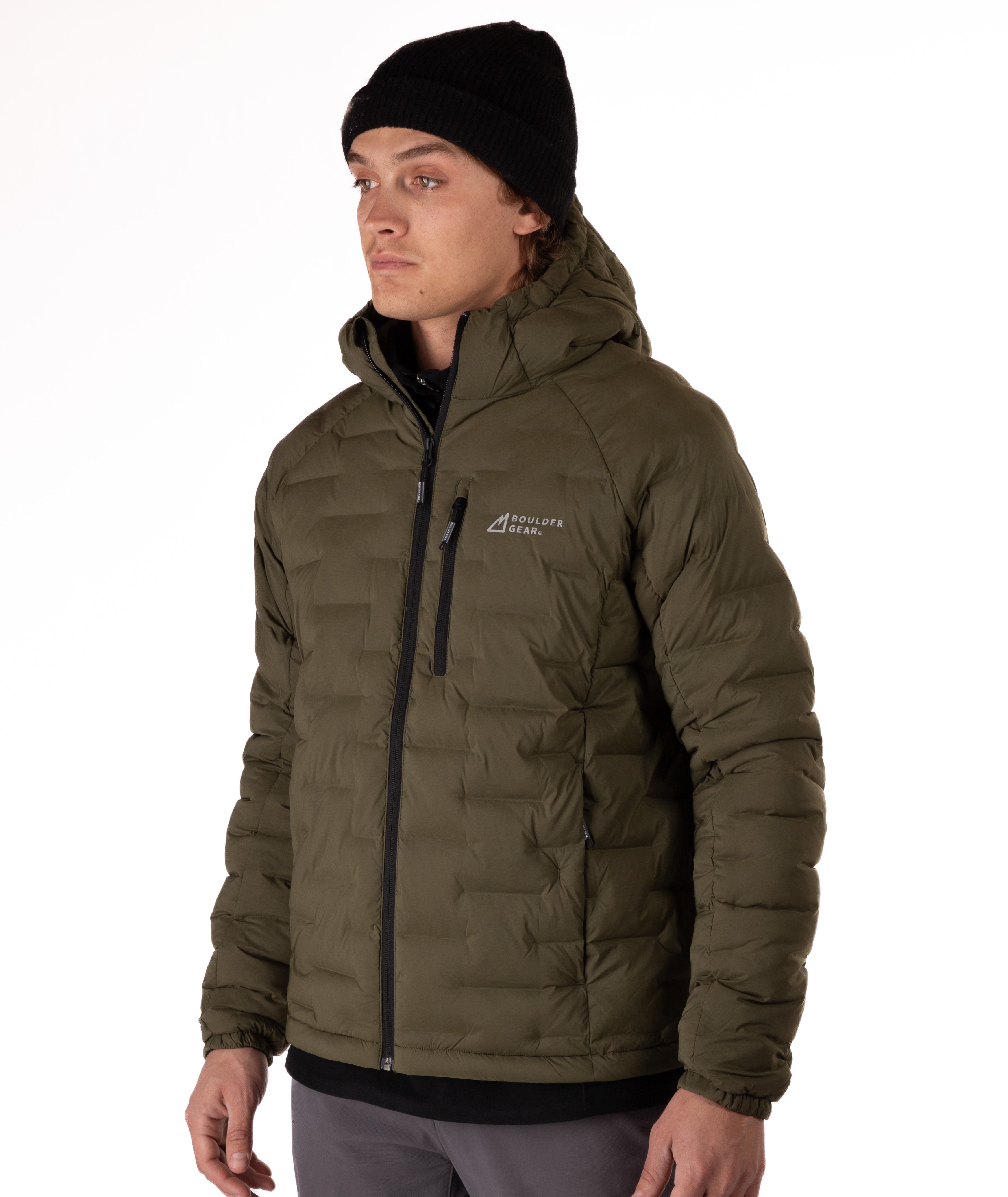 Man wearing a green puffer jacket with black zippers and a brand logo on a white background