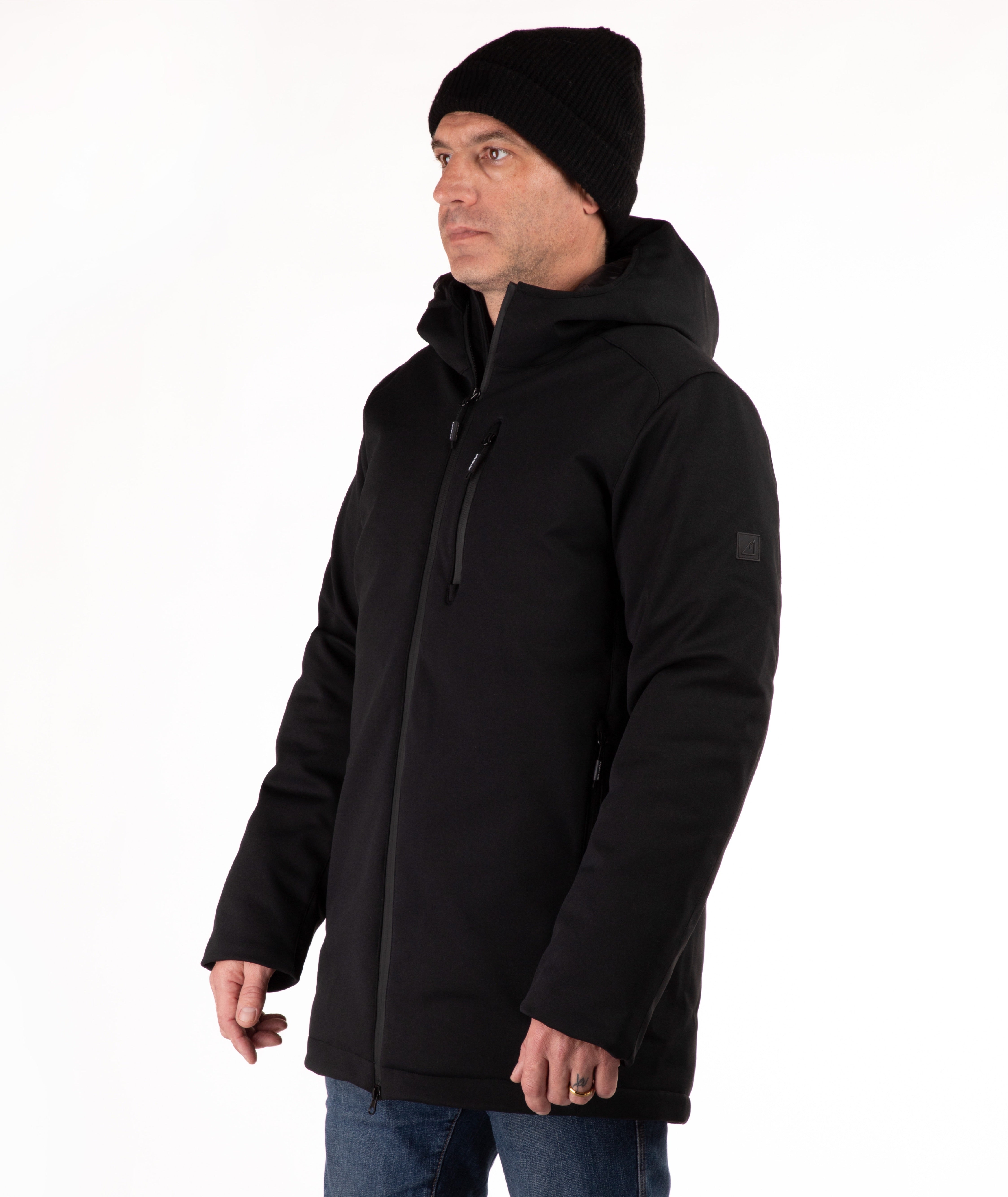 Man wearing a black hooded jacket on a white background