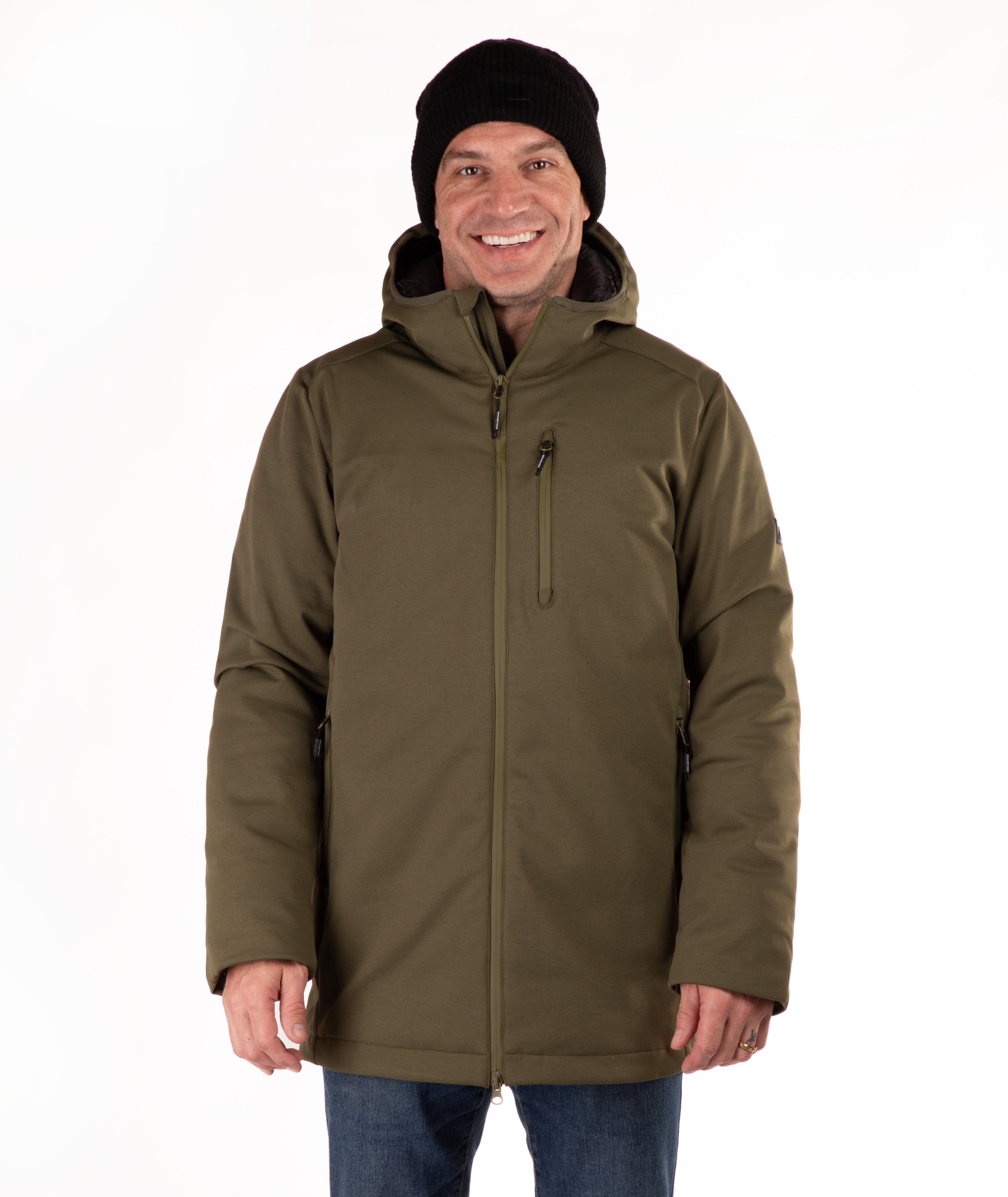 Man wearing a green hooded jacket and black beanie on a white background