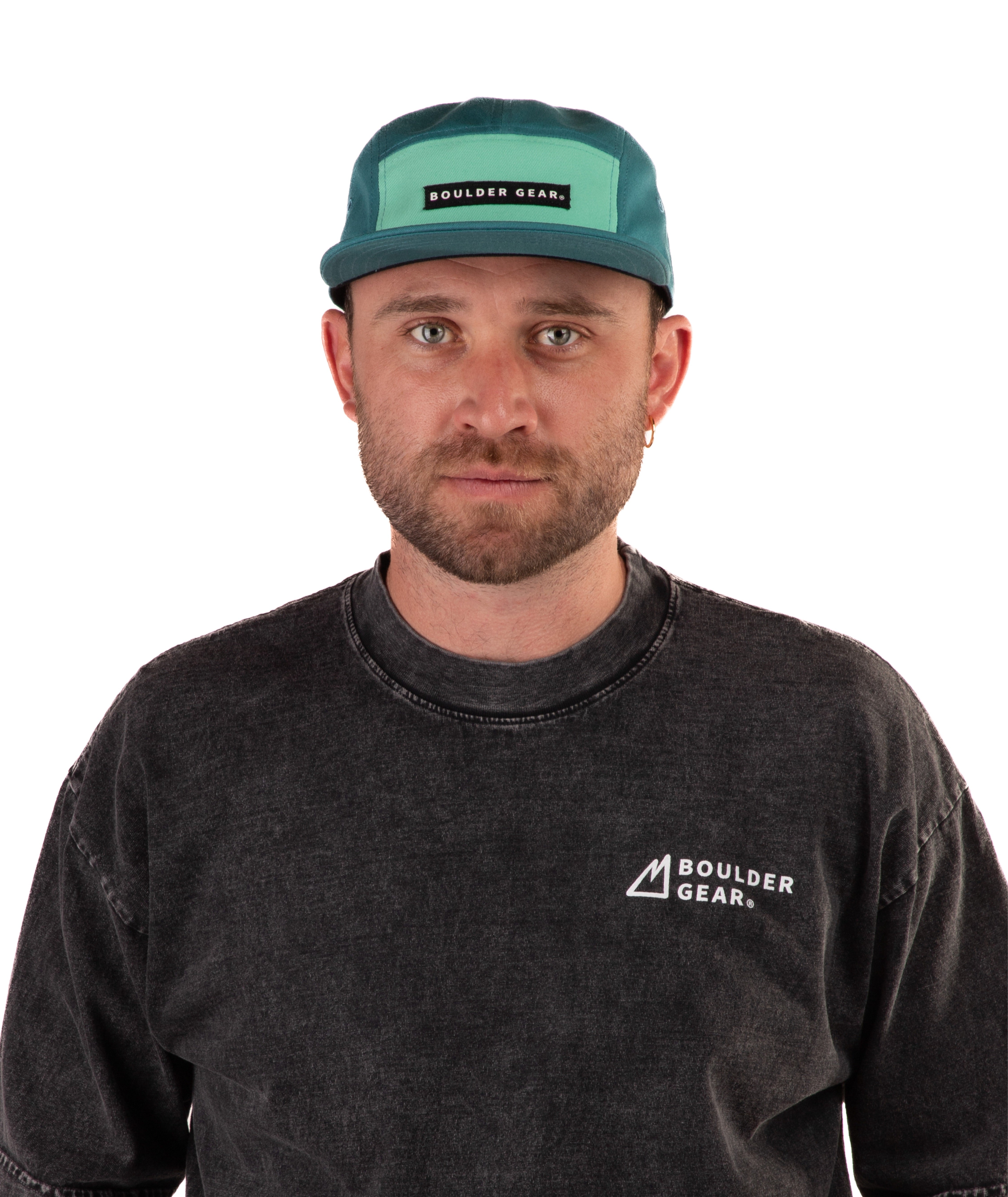 Man wearing a black T-shirt and green cap with 'Boulder Gear' logo on a white background