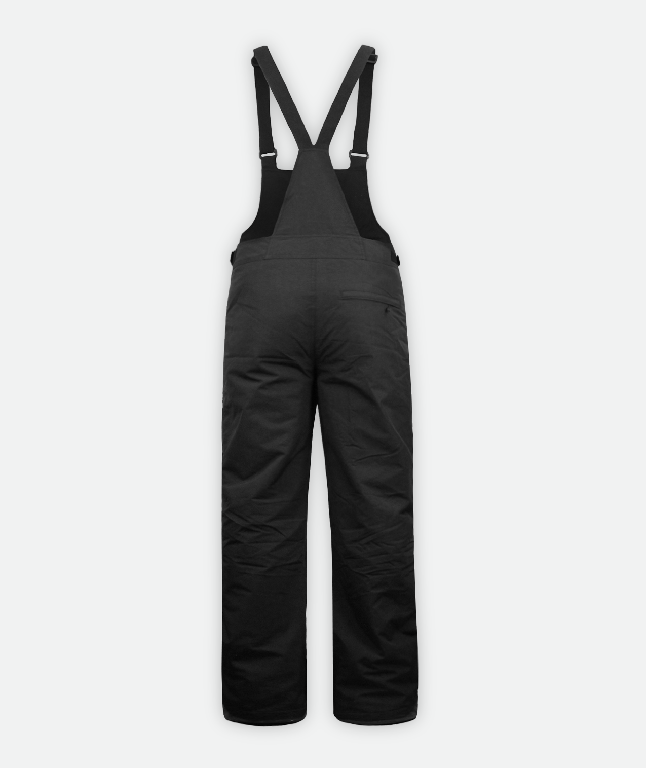 back of of pair of black ski bib overalls for women with adjustable shoulder straps and a snow cuff.