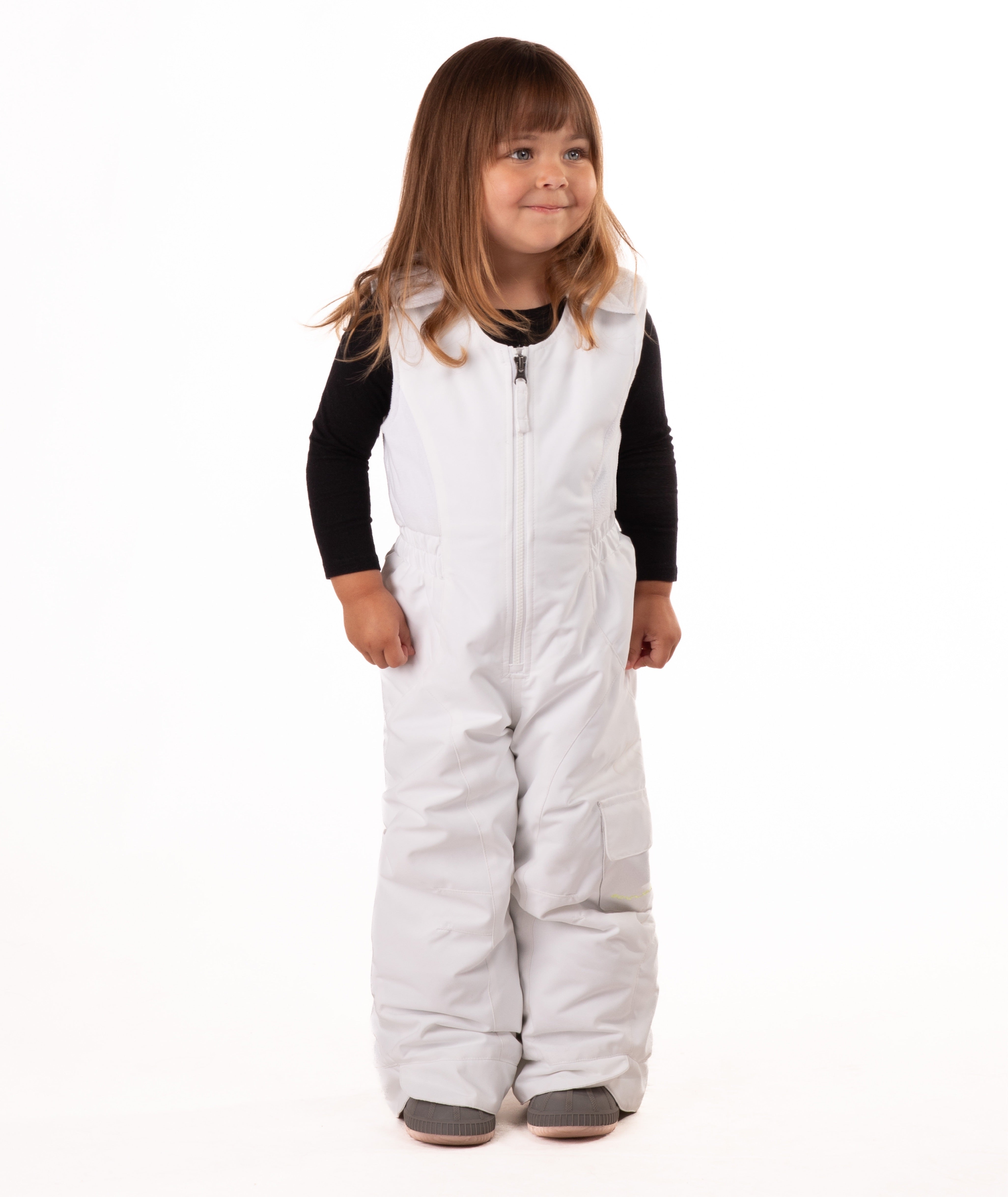 child wearing a white snow bib with black top on a white background