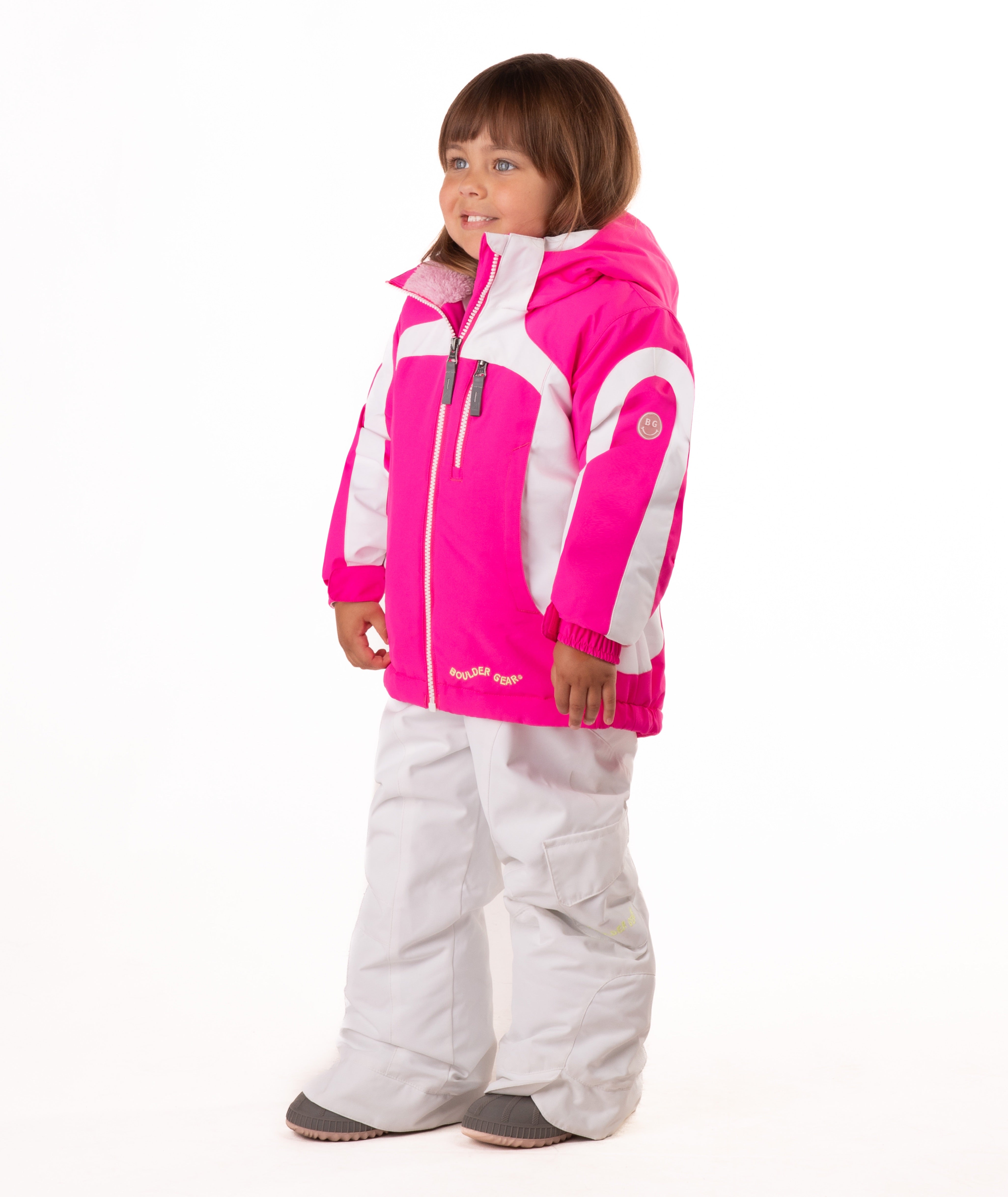 Child wearing a pink and white jacket with a visible Boulder Gear brand logo on a white background