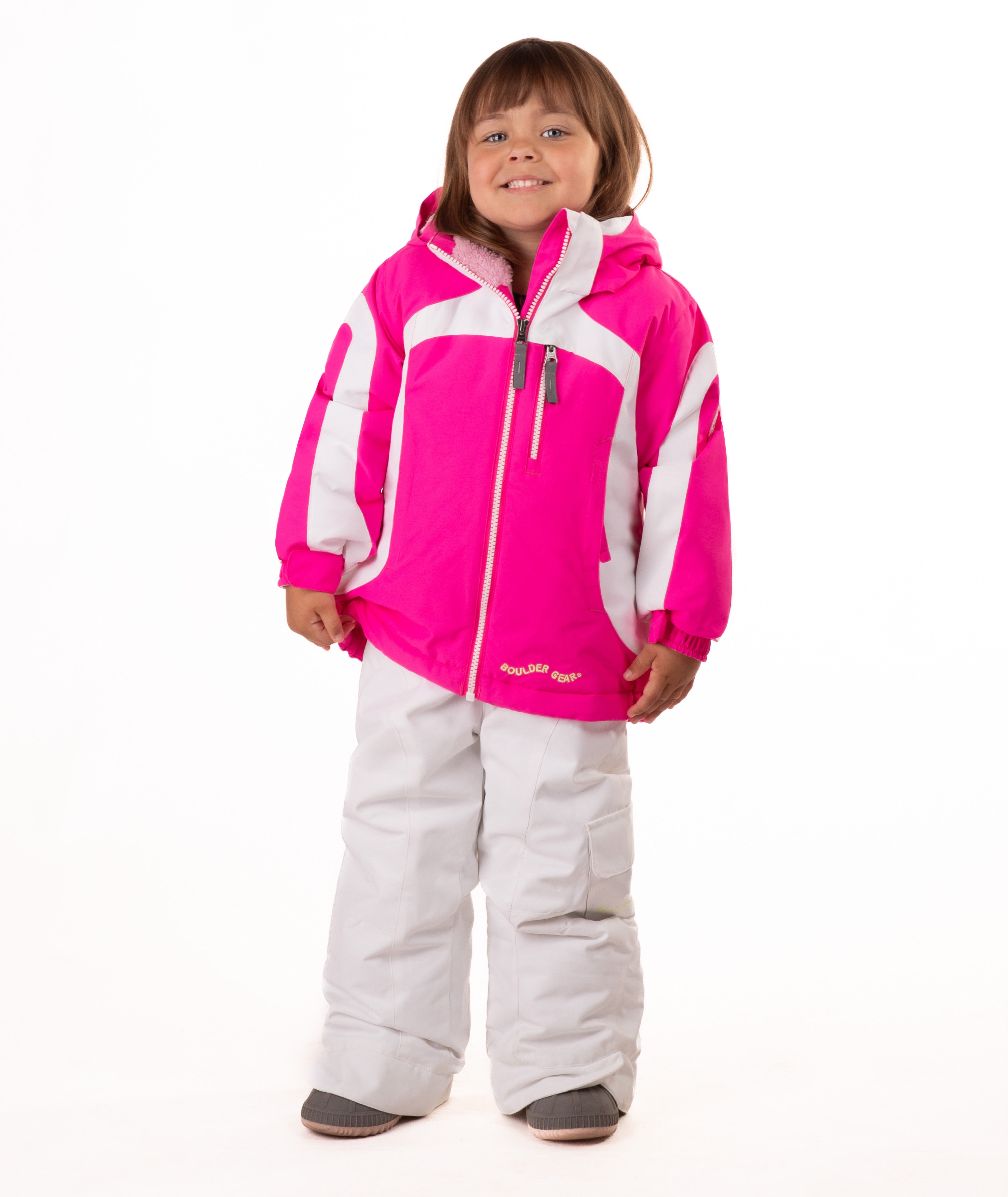 Child wearing a pink jacket with white trim on a white background