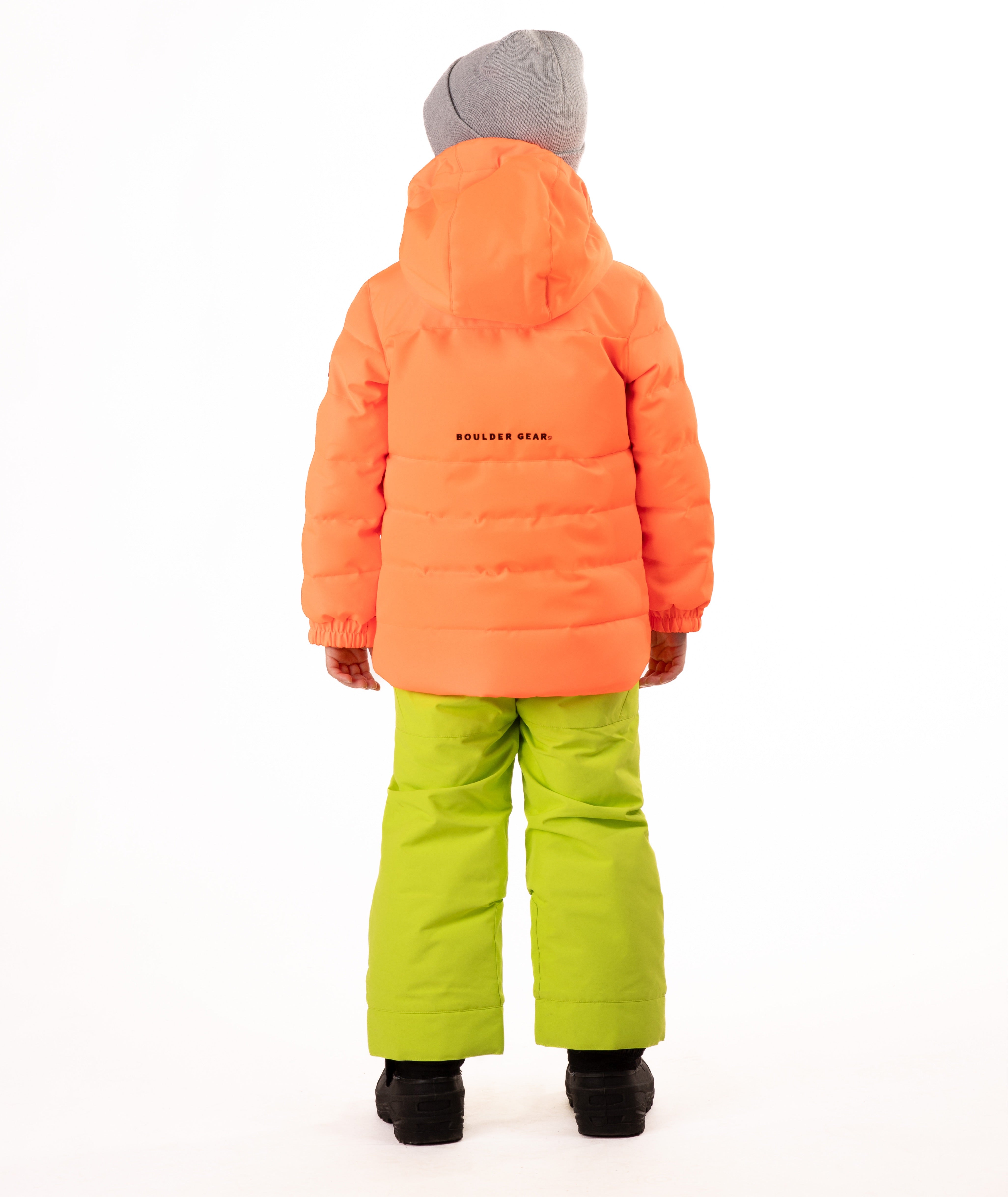 Child wearing an orange quilted winter jacket highlighting a visible brand logo on a white background
