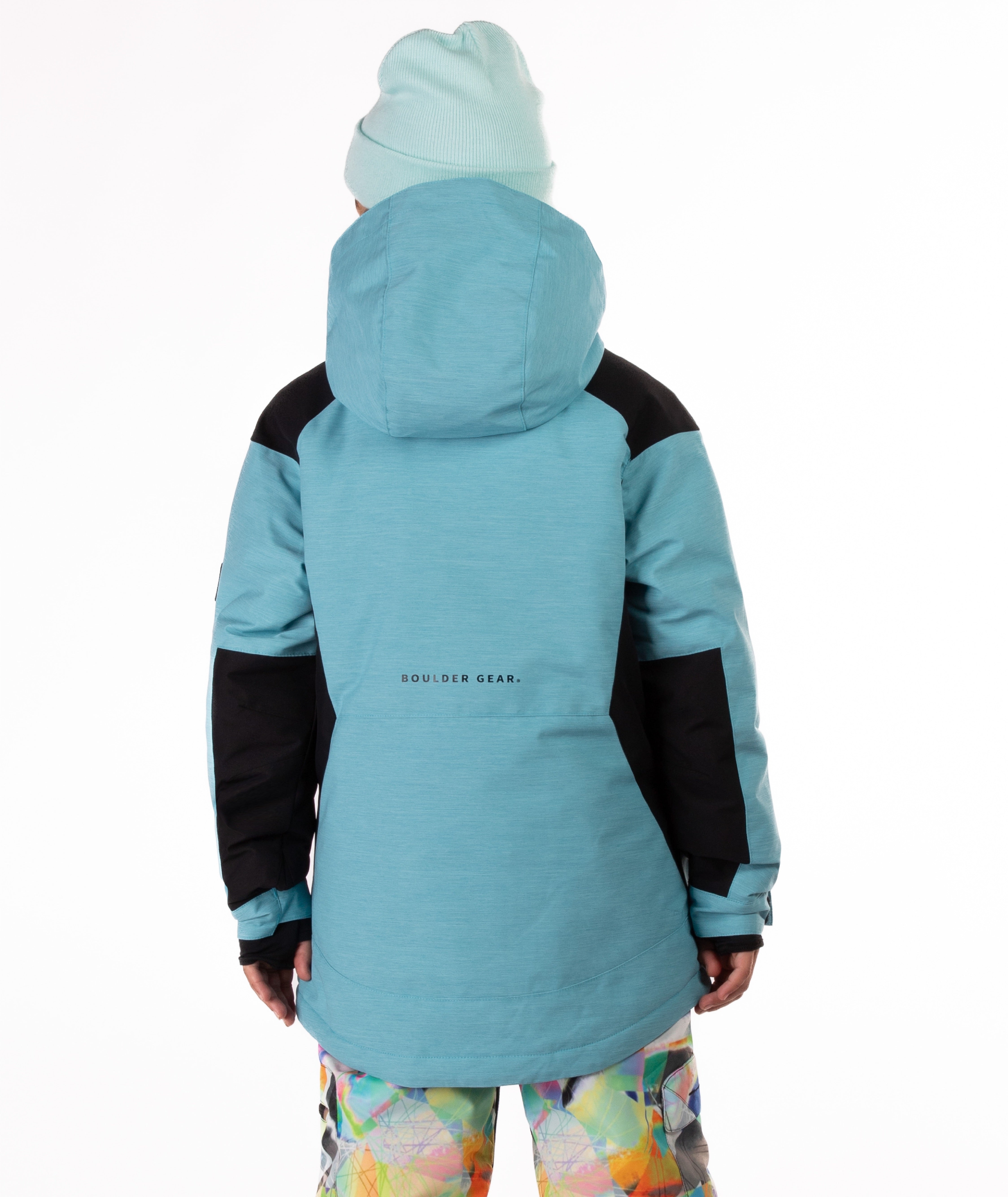 Youth Girl wearing a blue and black jacket with visible Boulder Gear brand logo on a white background