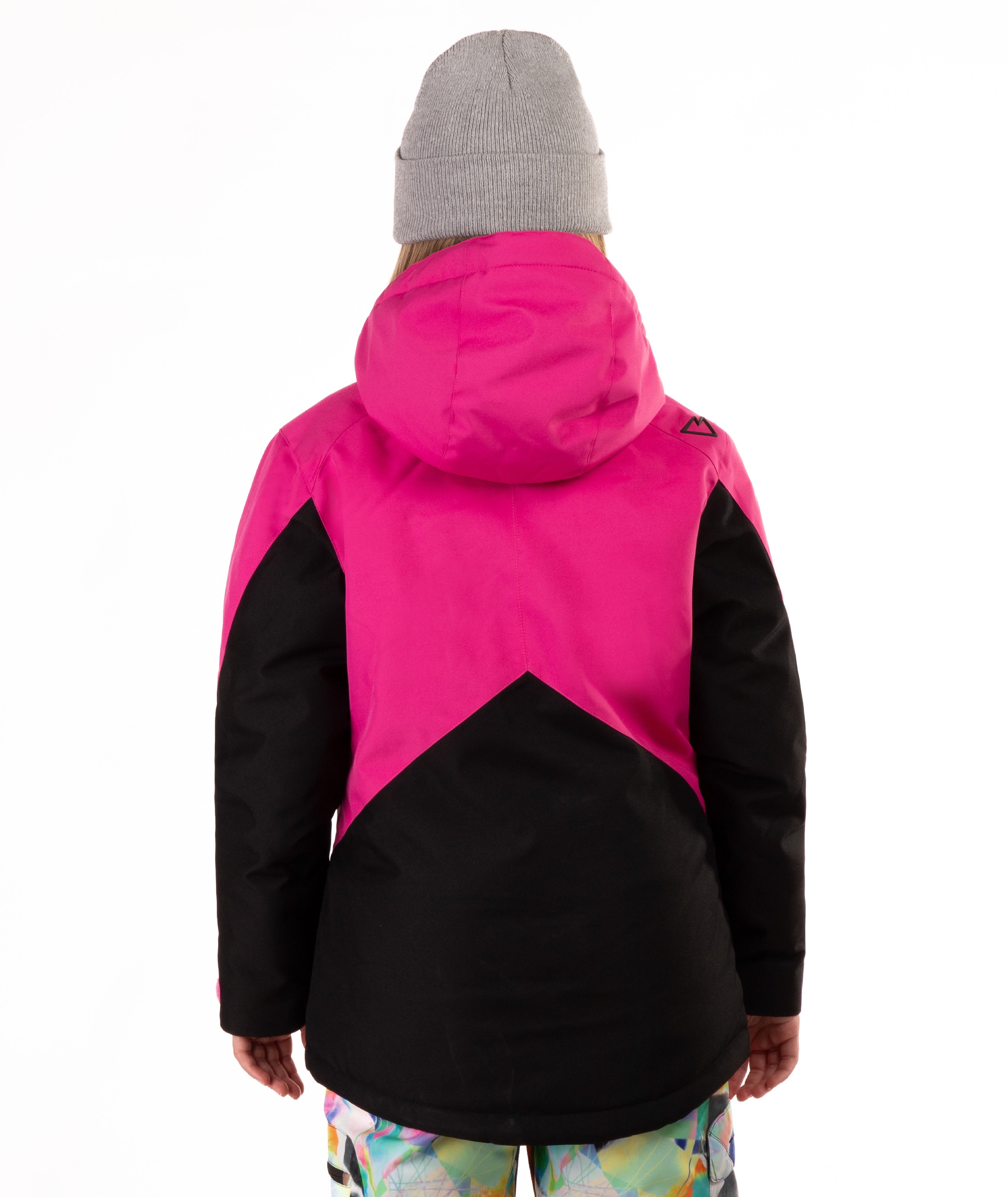 Child wearing a pink and black jacket with contrast zippers on a white background