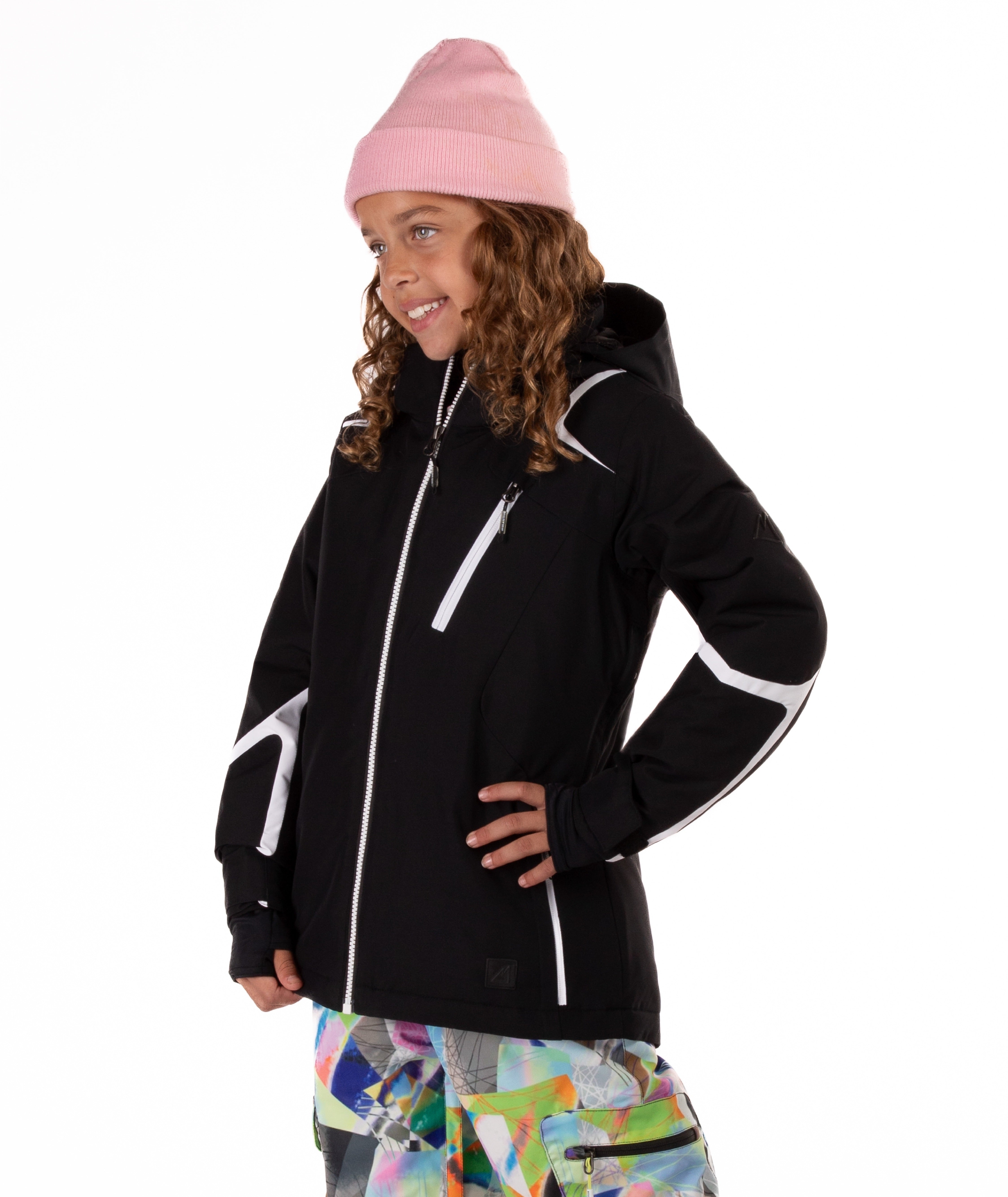 Youth girl wearing a black jacket with white accents on a white background