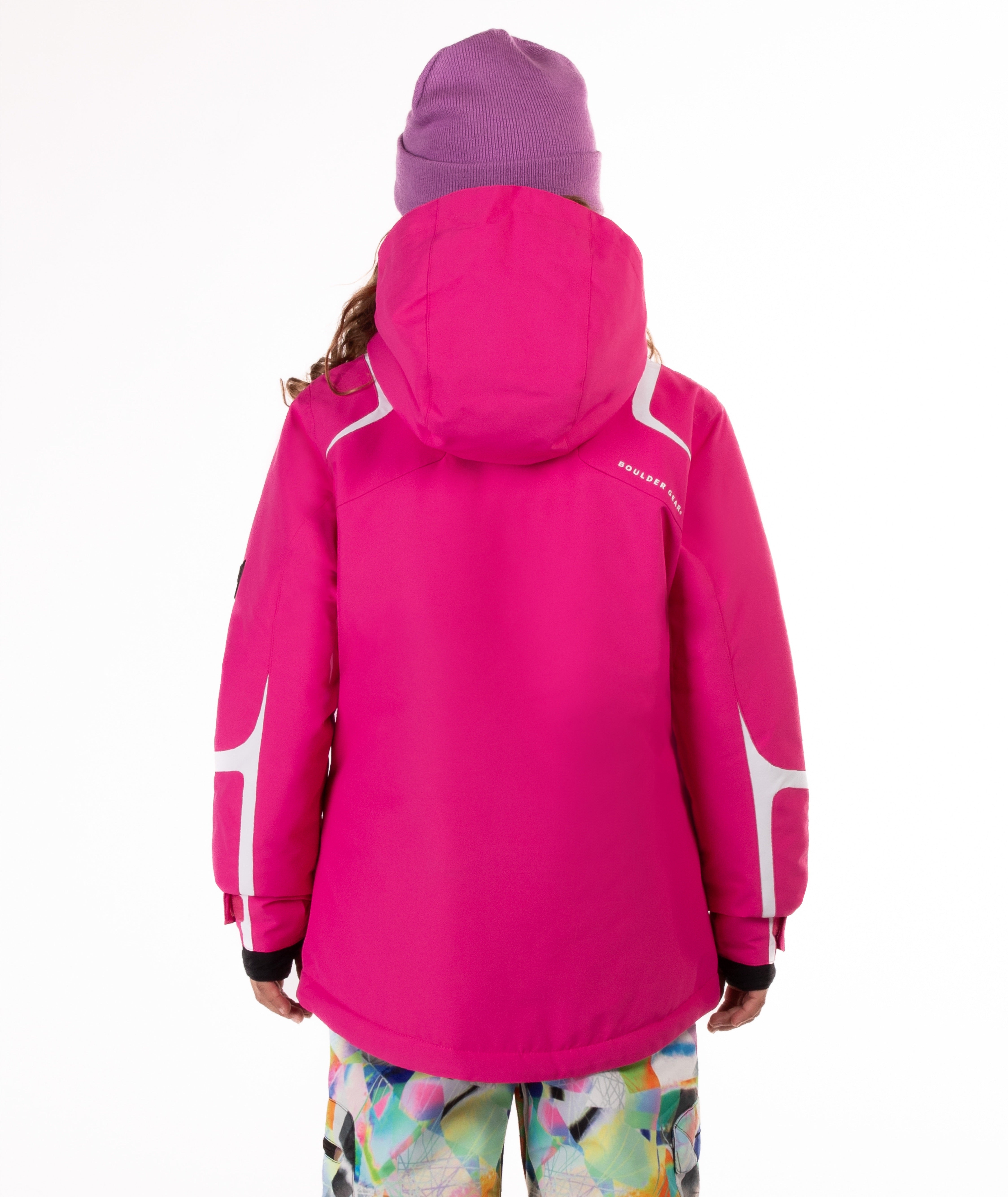Youth Girl wearing a bright pink jacket with a hood on a white background