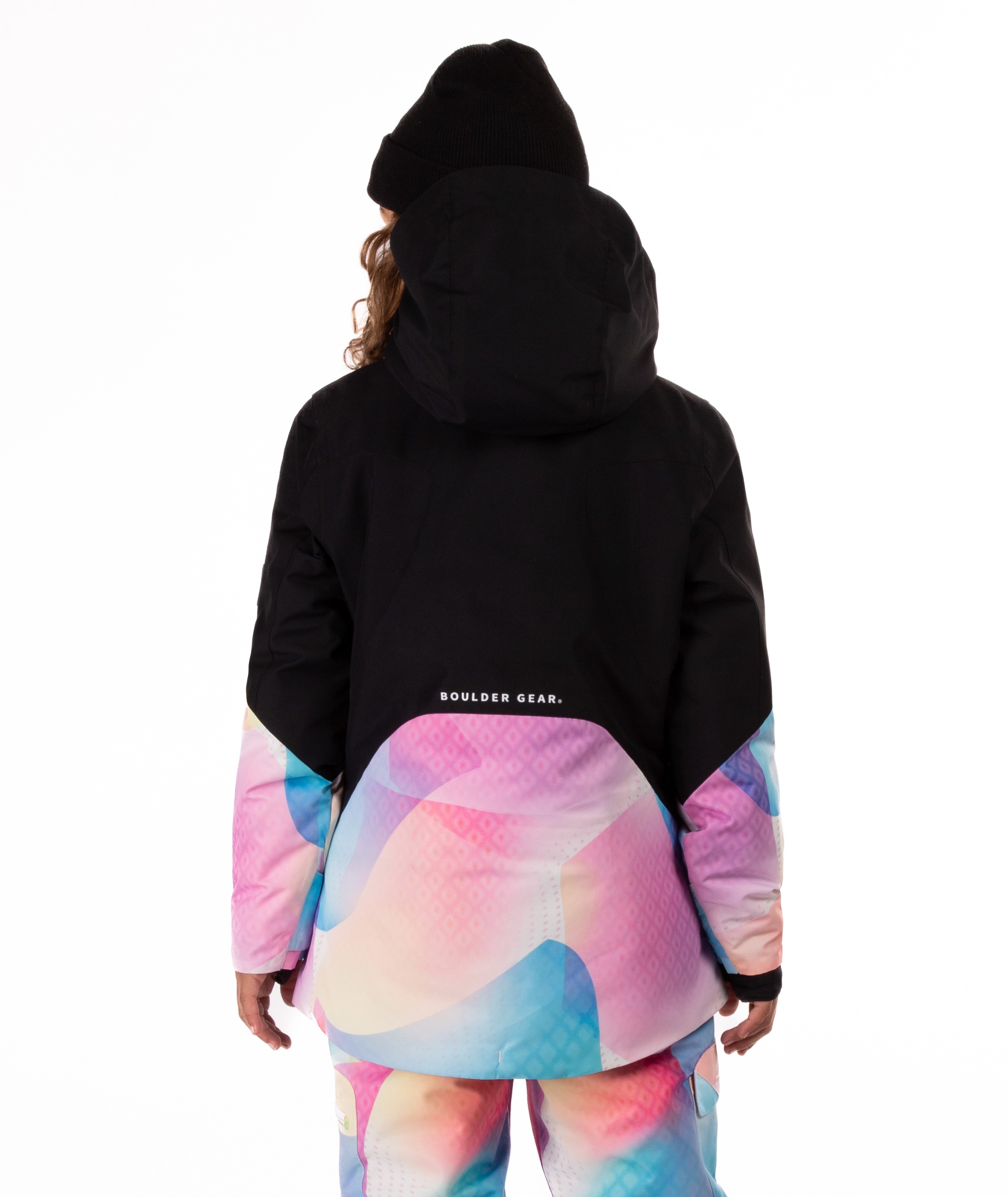 Person wearing a colorful patterned on the bottom of the jacket on a white background