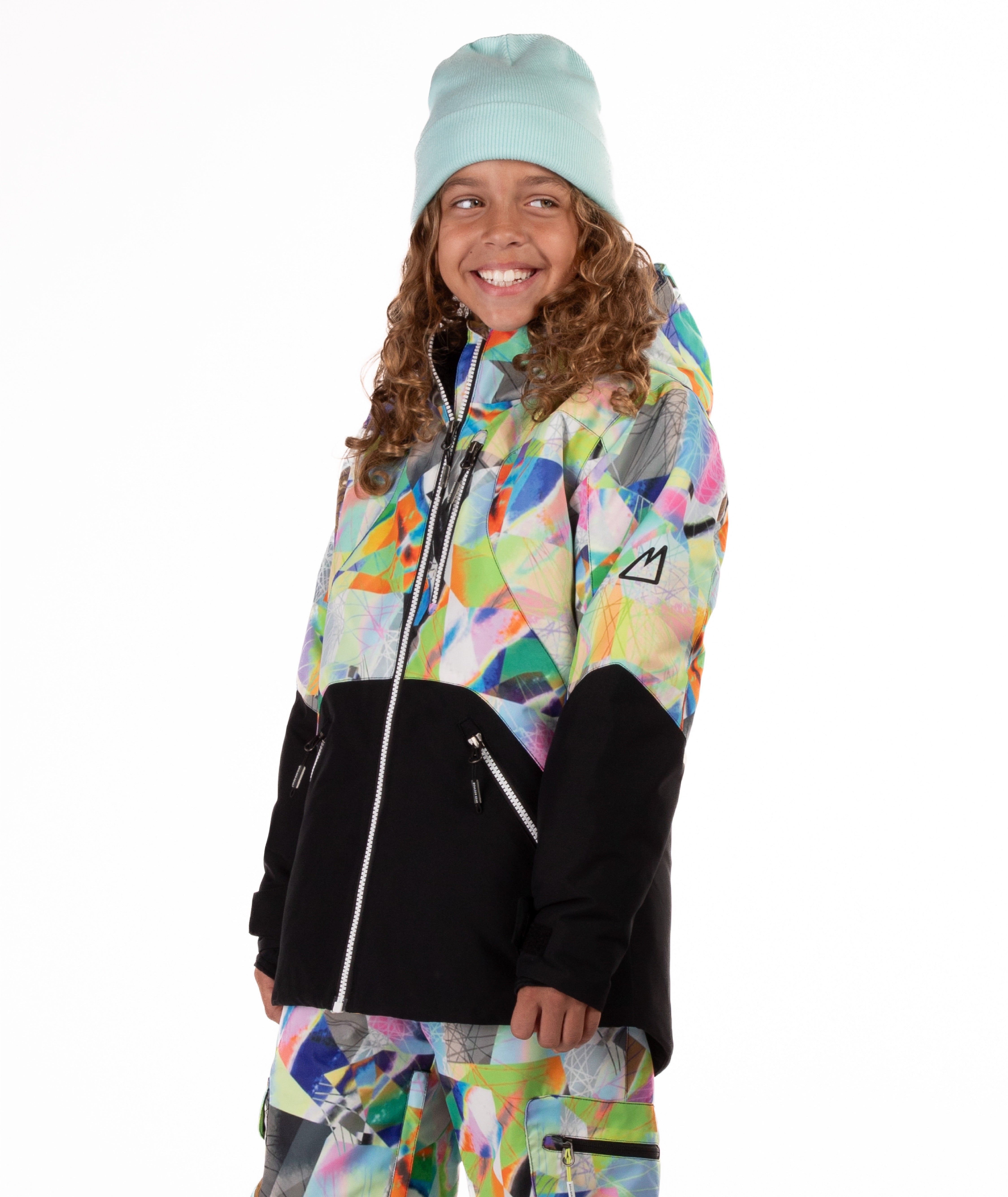 Person wearing a colorful patterned jacket on a white background