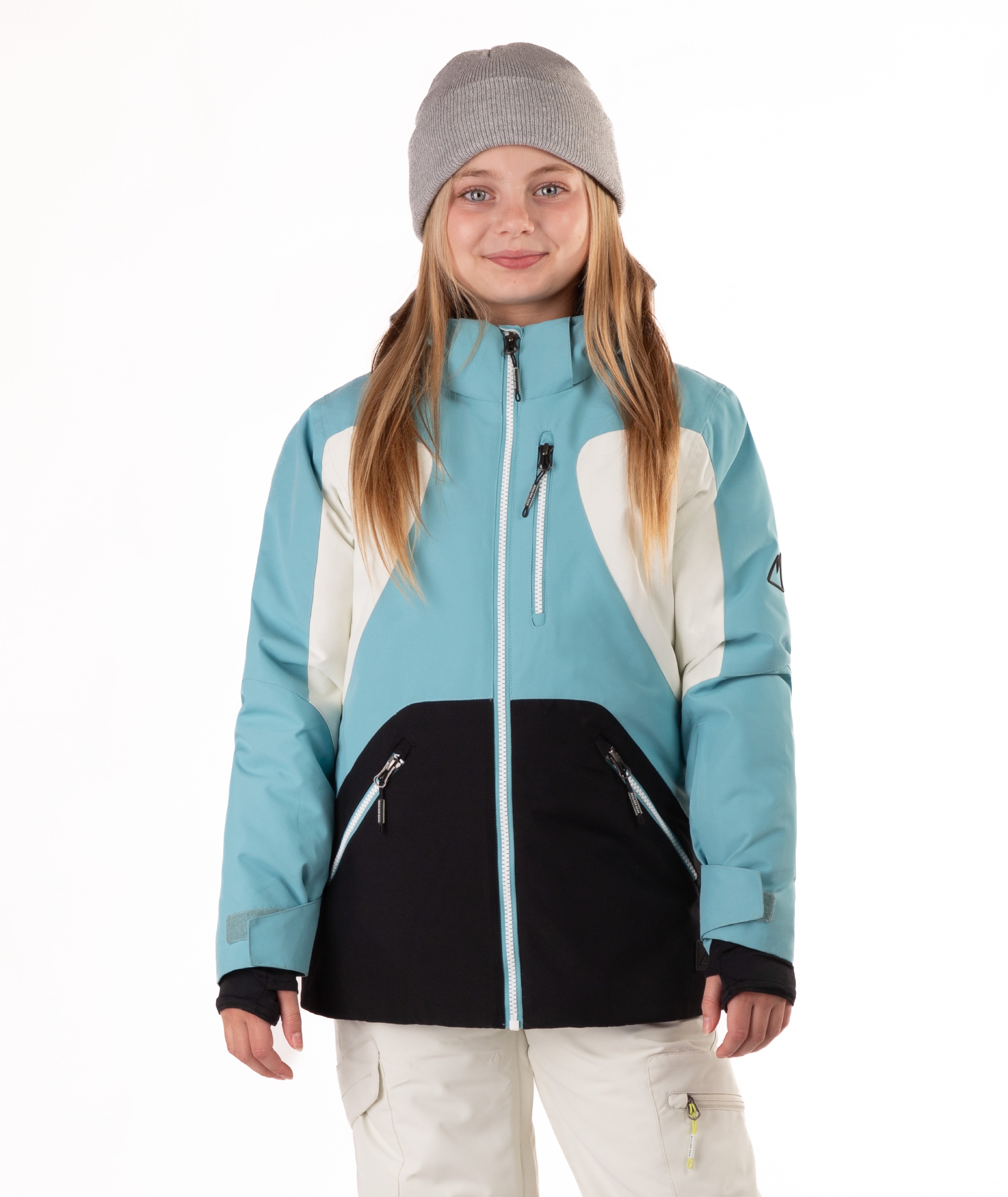 Youth Girl wearing a blue, white and black jacket with a white background