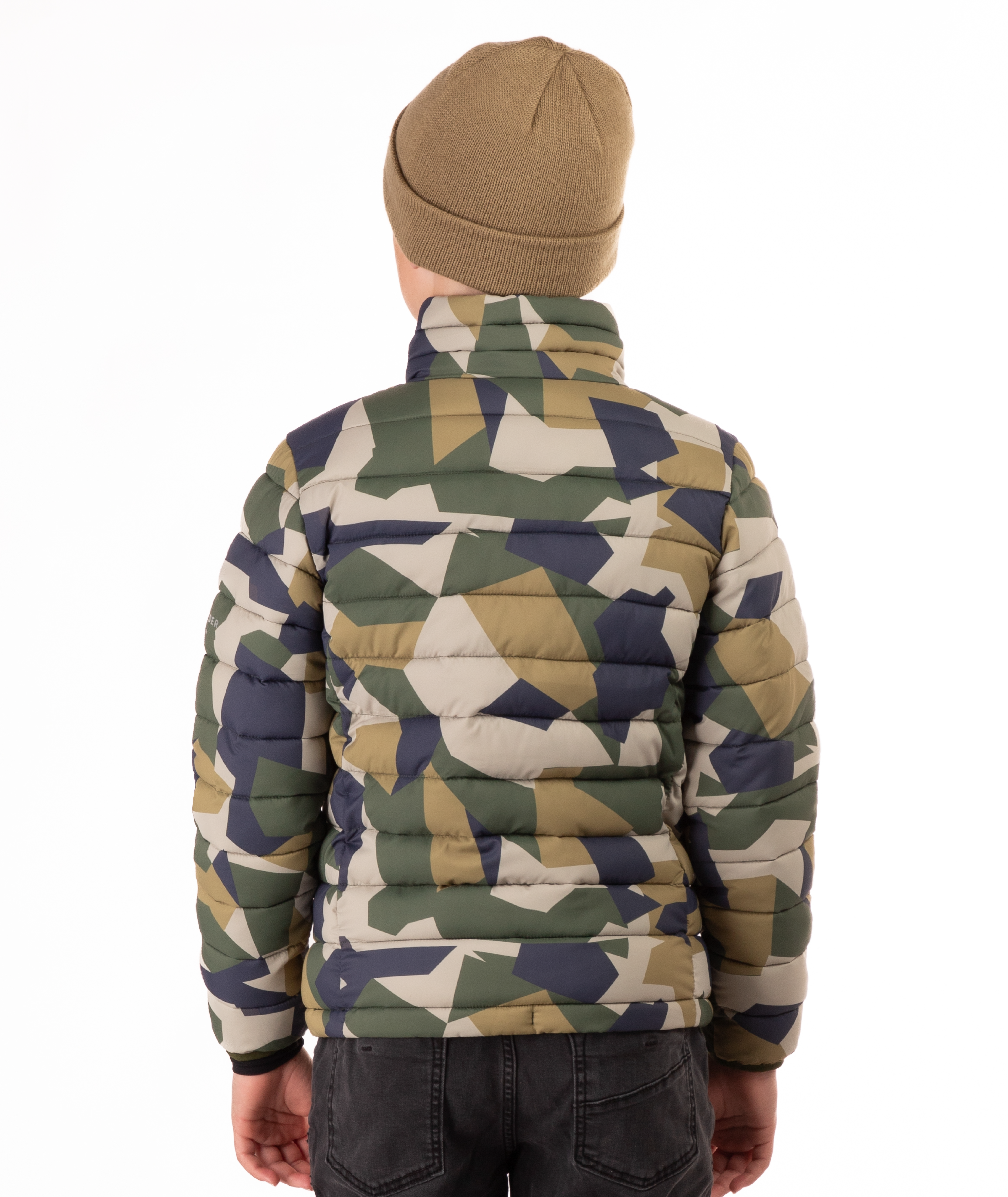 back of youth boy wearing a camouflage puffer jacket on a white background