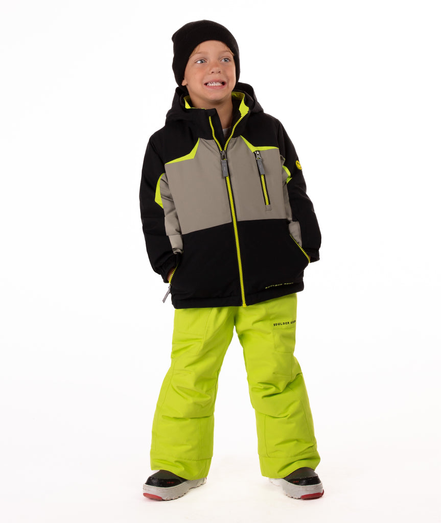 Child wearing an black and grey insulated winter jacket with bright lime trim and a lime center front zipper 