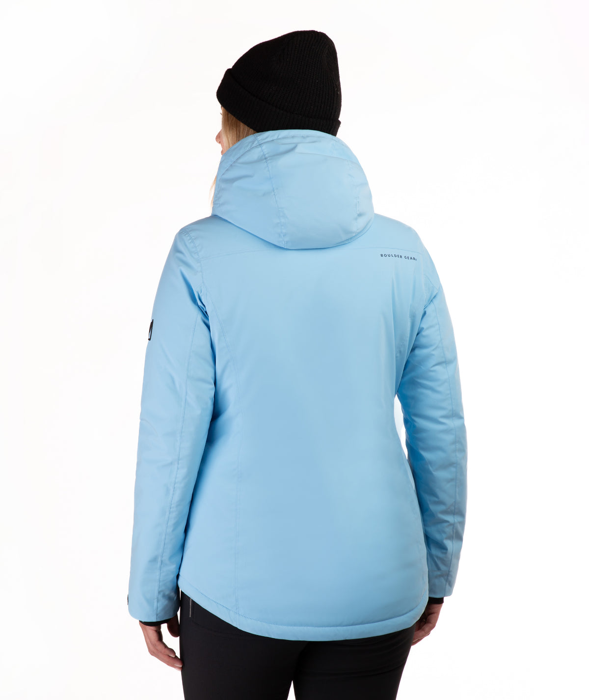 A person shown from the back wearing a light blue hooded jacket and a black beanie against a plain white studio background.