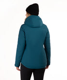 A woman shown from the back wearing a teal hooded puffer jacket, a black beanie, and black leggings against a plain white studio background.