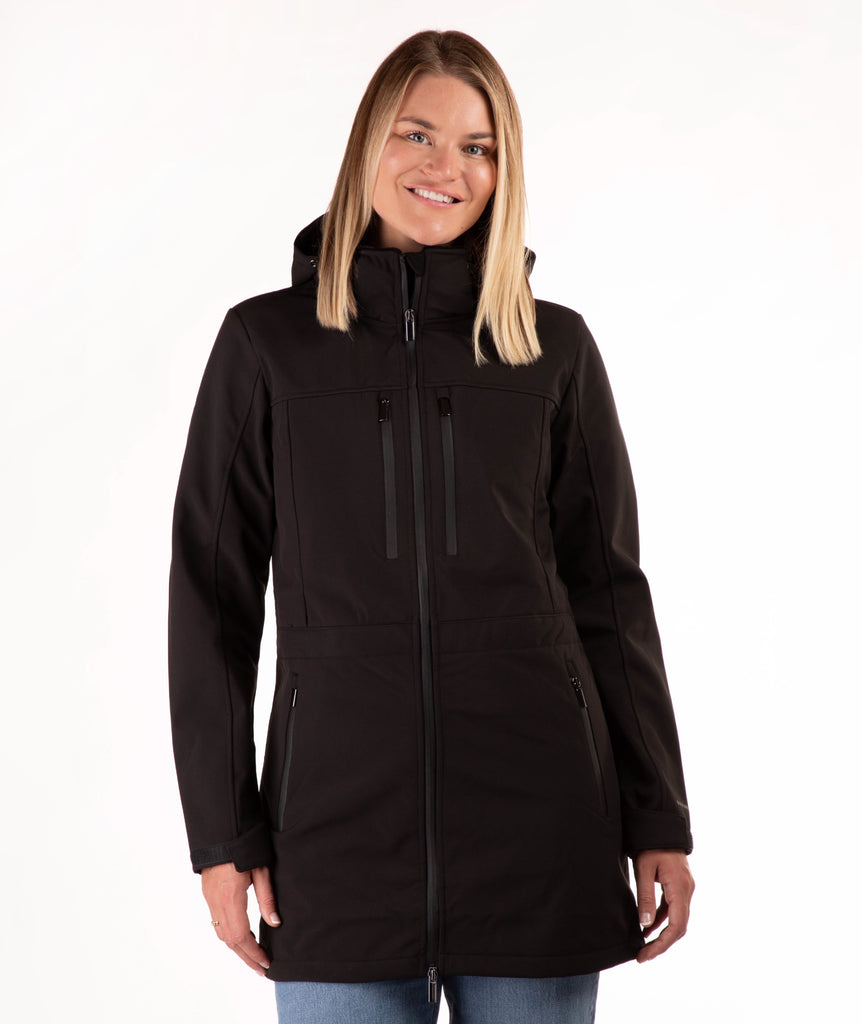 Woman wearing a black coat on a white background