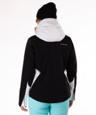 Person wearing a black and white jacket with a hood on a white background