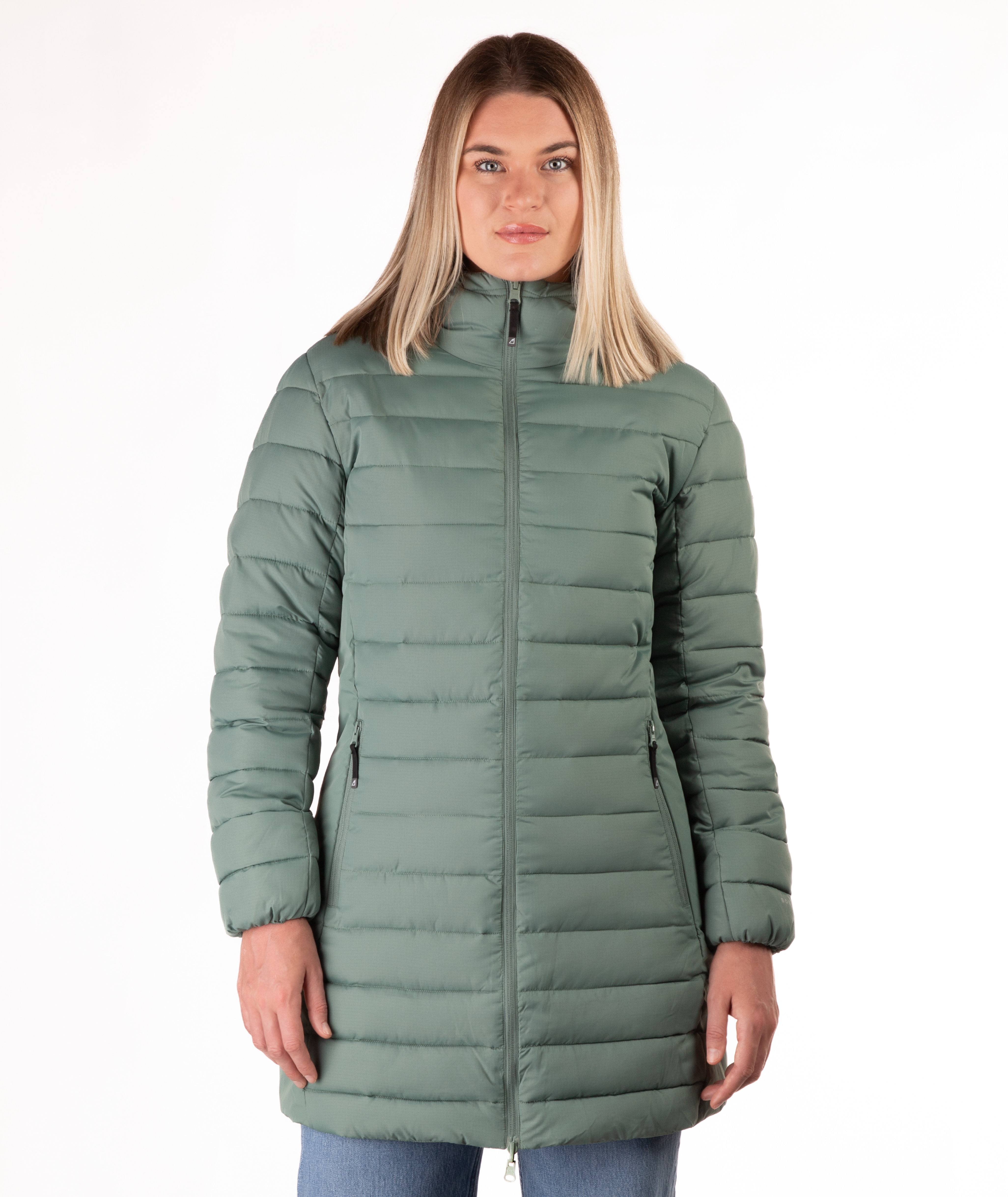 Woman wearing a green mid thigh length puffer coat on a white background
