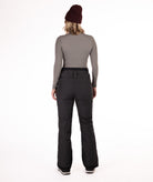 back of Person wearing black rip stop patterned pants with white thread pants on a white background