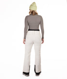 back of Person wearing off white colored pants on a white background