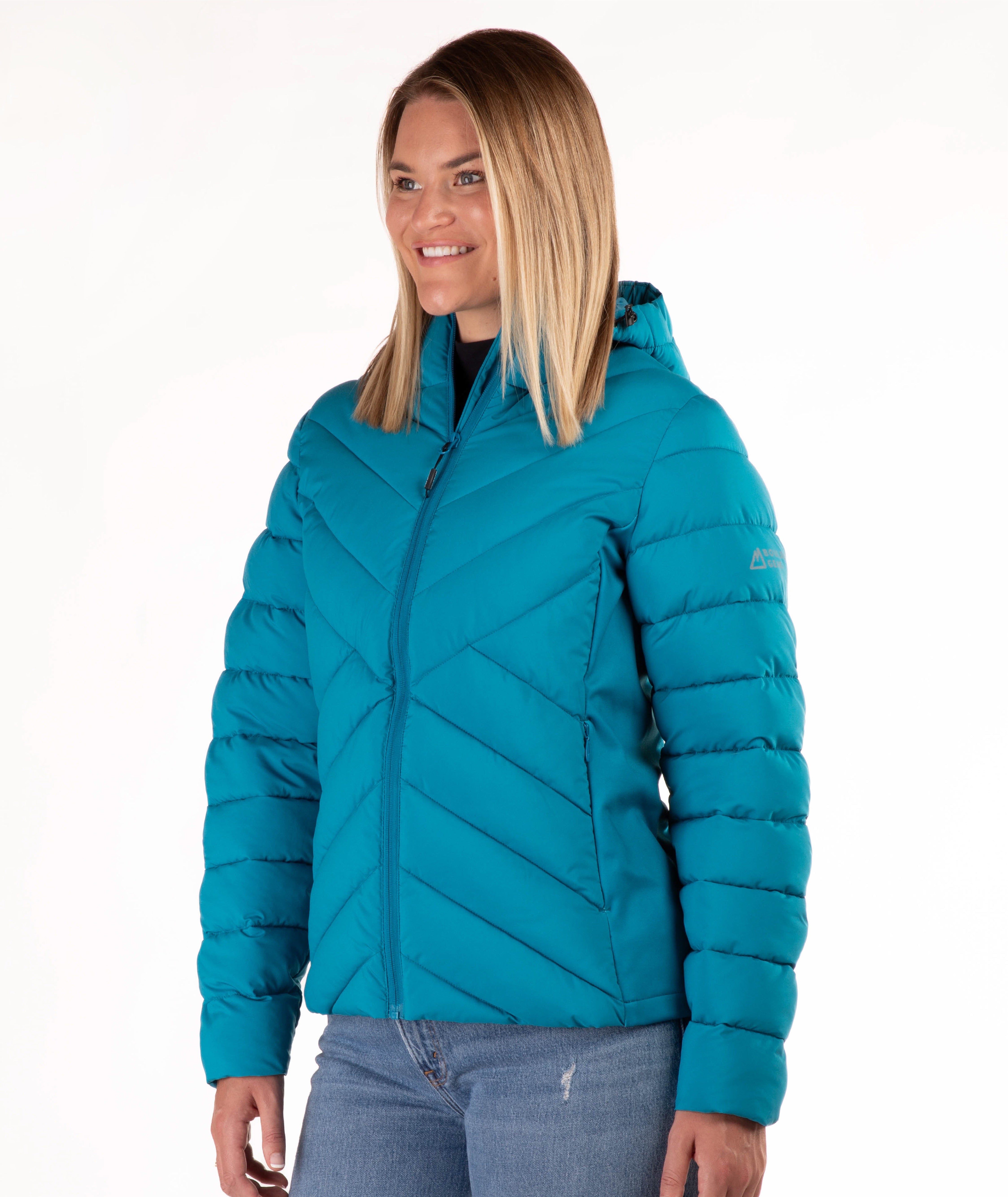A woman wearing a teal blue hooded puffer jacket with a full-zip front, shown from the waist up against a plain white background.