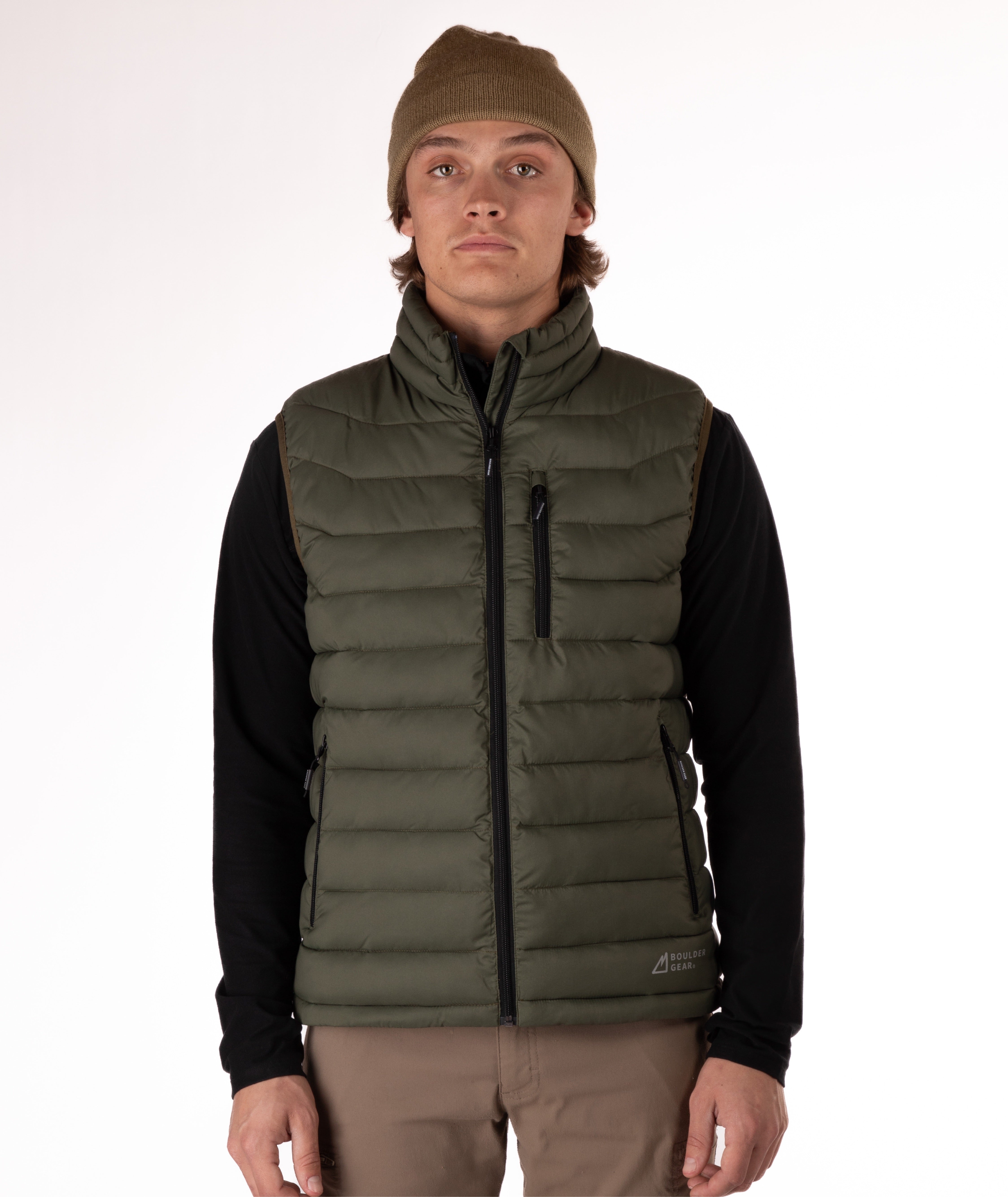 Man wearing a green puffer vest over a black shirt on a white background