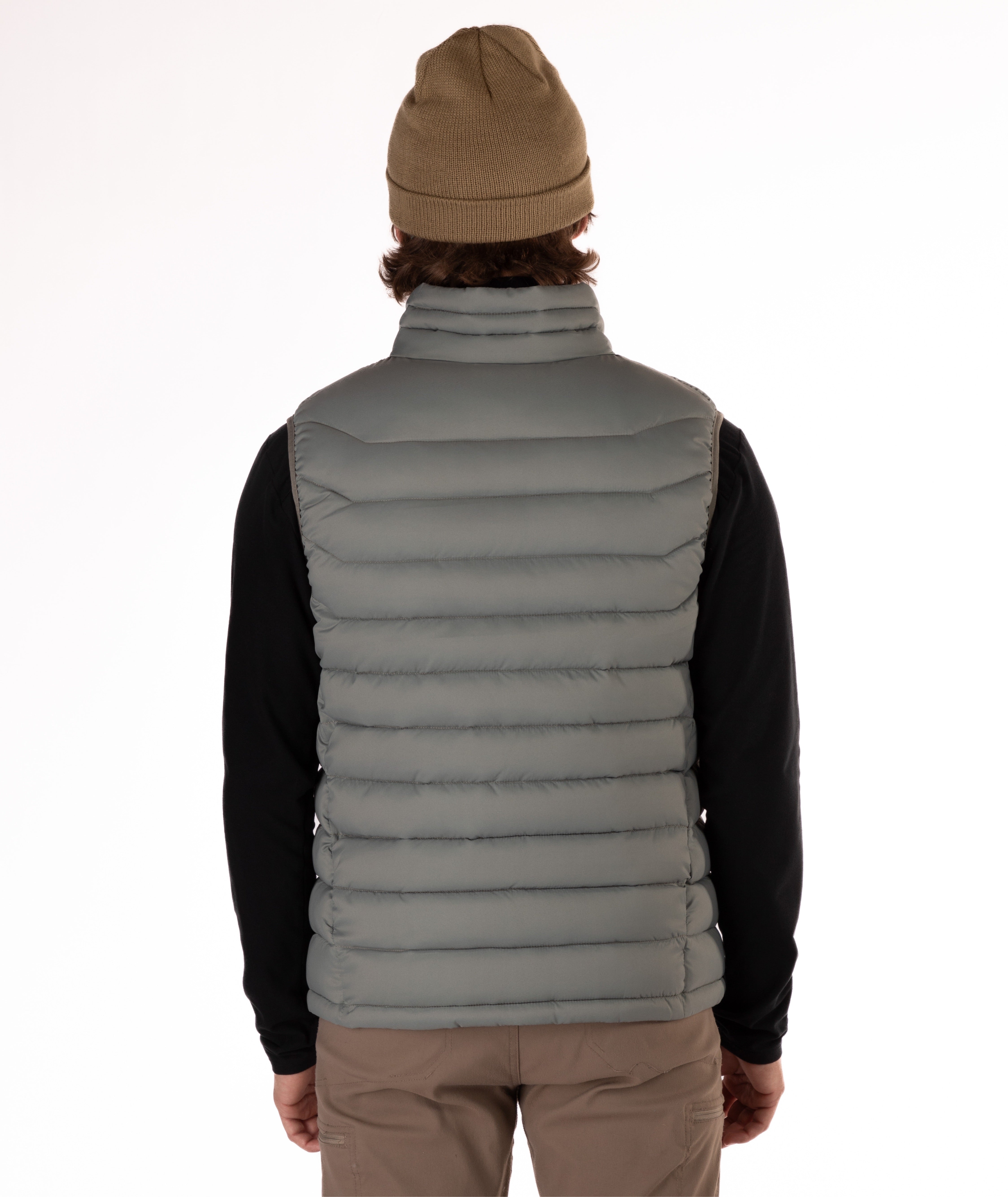 back of Man wearing a beige puffer vest over a black shirt on a white background