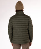 back of Man wearing a green puffer jacket on a white background