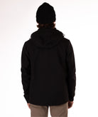 back of Man wearing a black jacket with a white background