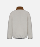 a cream fleece jacket with brown collar on a white background