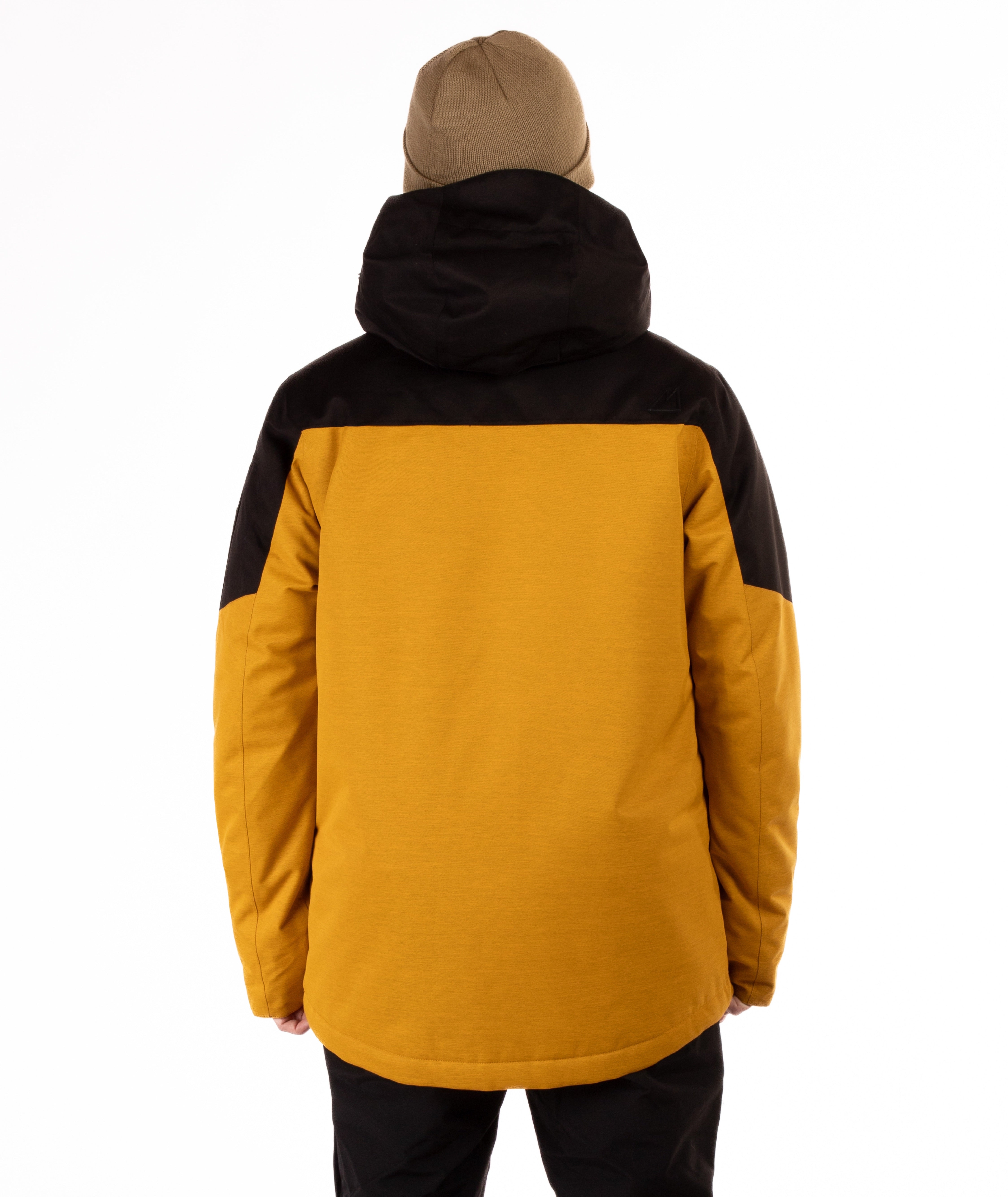 Person wearing a black and mustard yellow jacket on a white background