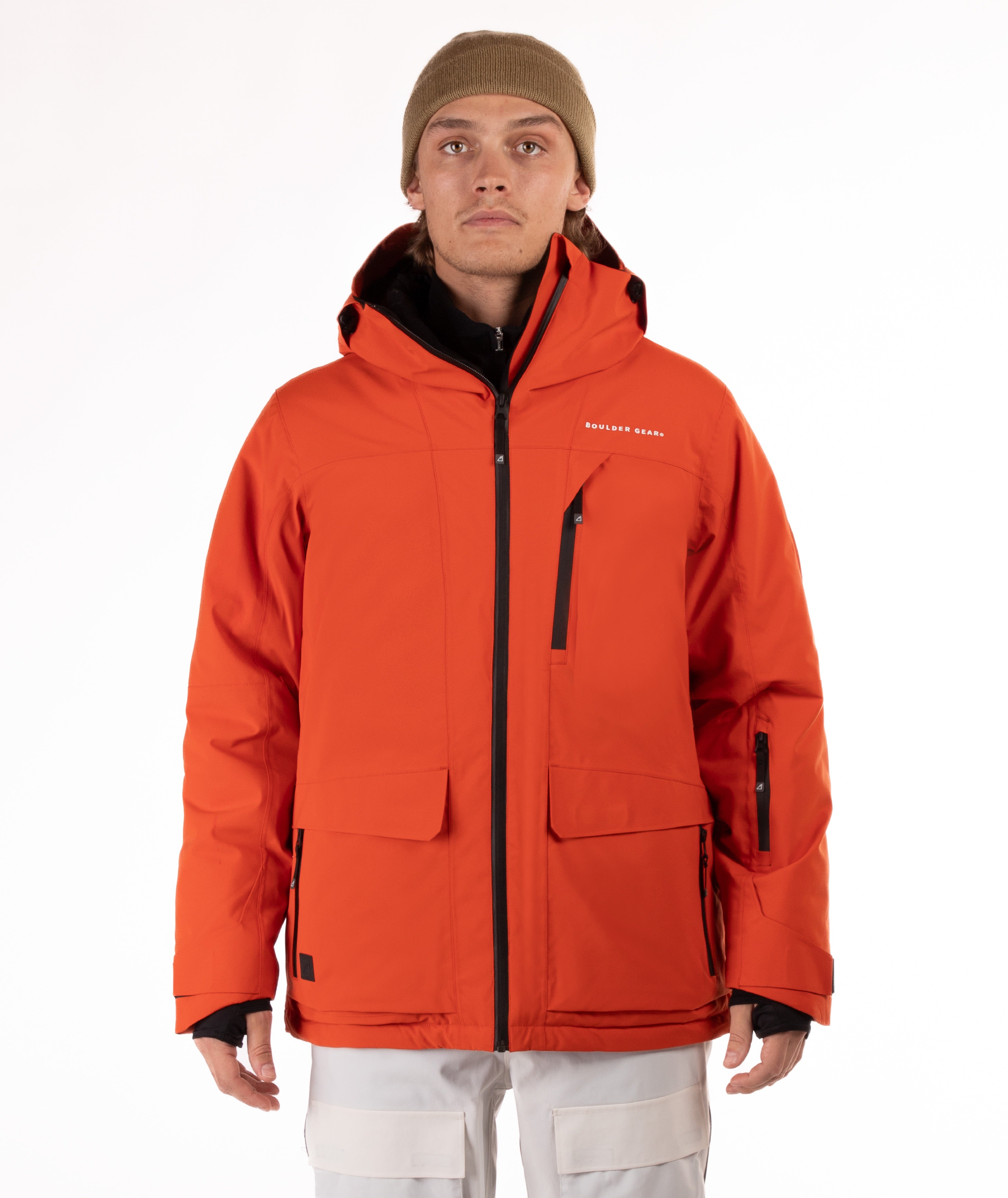 Man wearing a hooded orange jacket with a brand logo on a white background