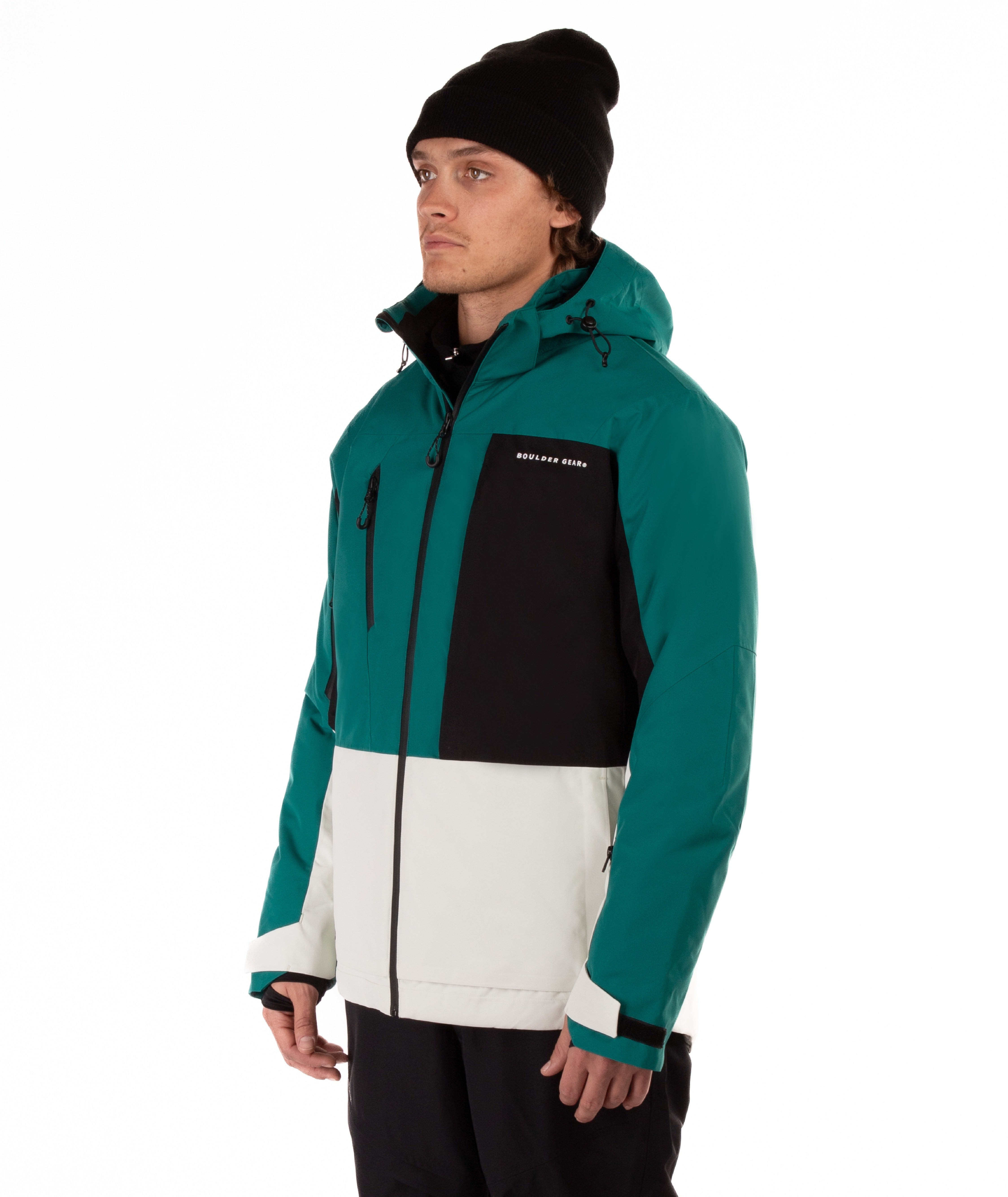 Man wearing a teal, black, and white jacket with a visible brand logo on a white background