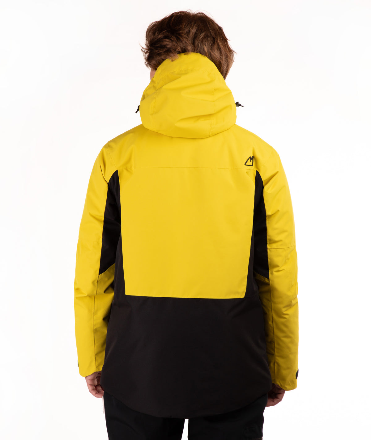 A person shown from the back wearing a hooded jacket with a bright yellow upper section and black lower section and side panels, photographed against a clean white studio background.
