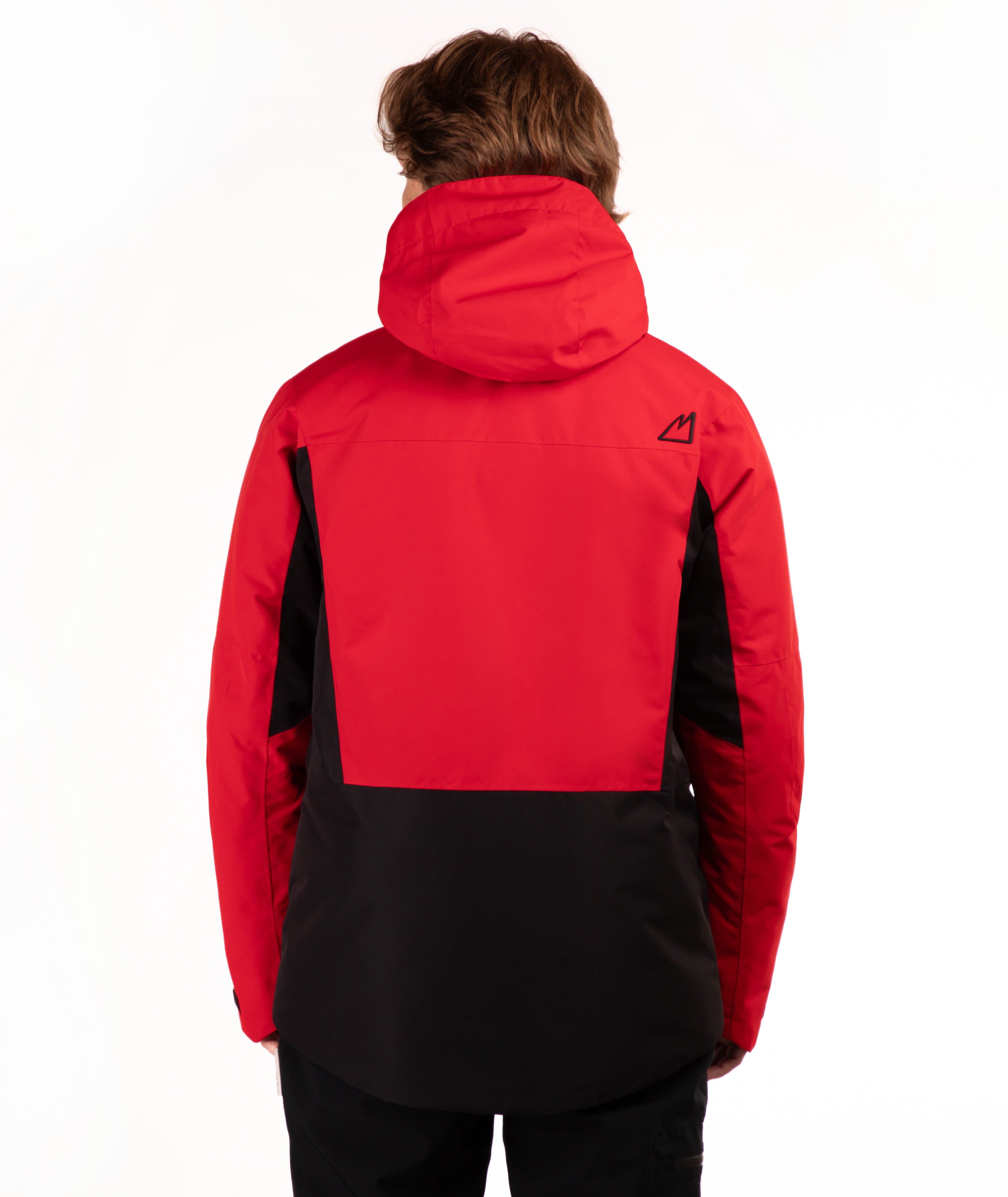 A person shown from the back wearing a red and black hooded jacket, photographed against a clean white studio background.