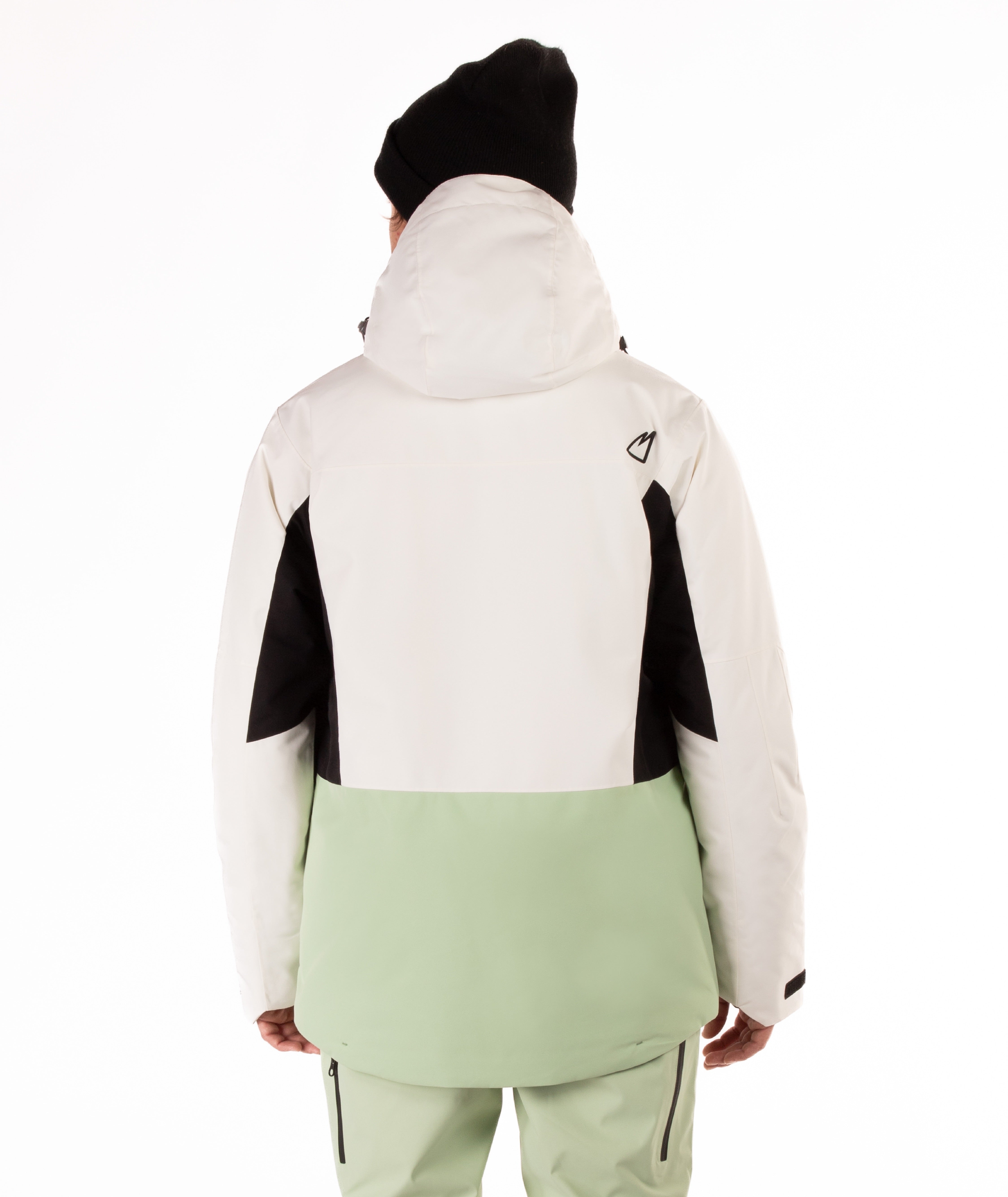 Person wearing a white, black, and light green jacket with a hood on a white background