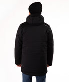 back of Man wearing a black hooded jacket on a white background