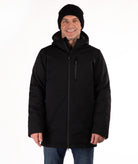 Man wearing a black hooded jacket on a white background