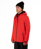 Person wearing a red jacket with black accents on a white background