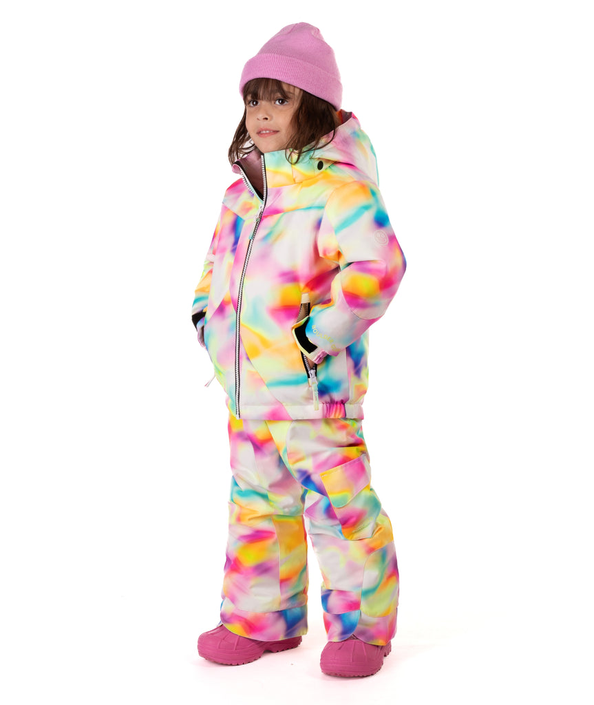 Child wearing a colorful colorful tie-dye winter jacket on a white background. 